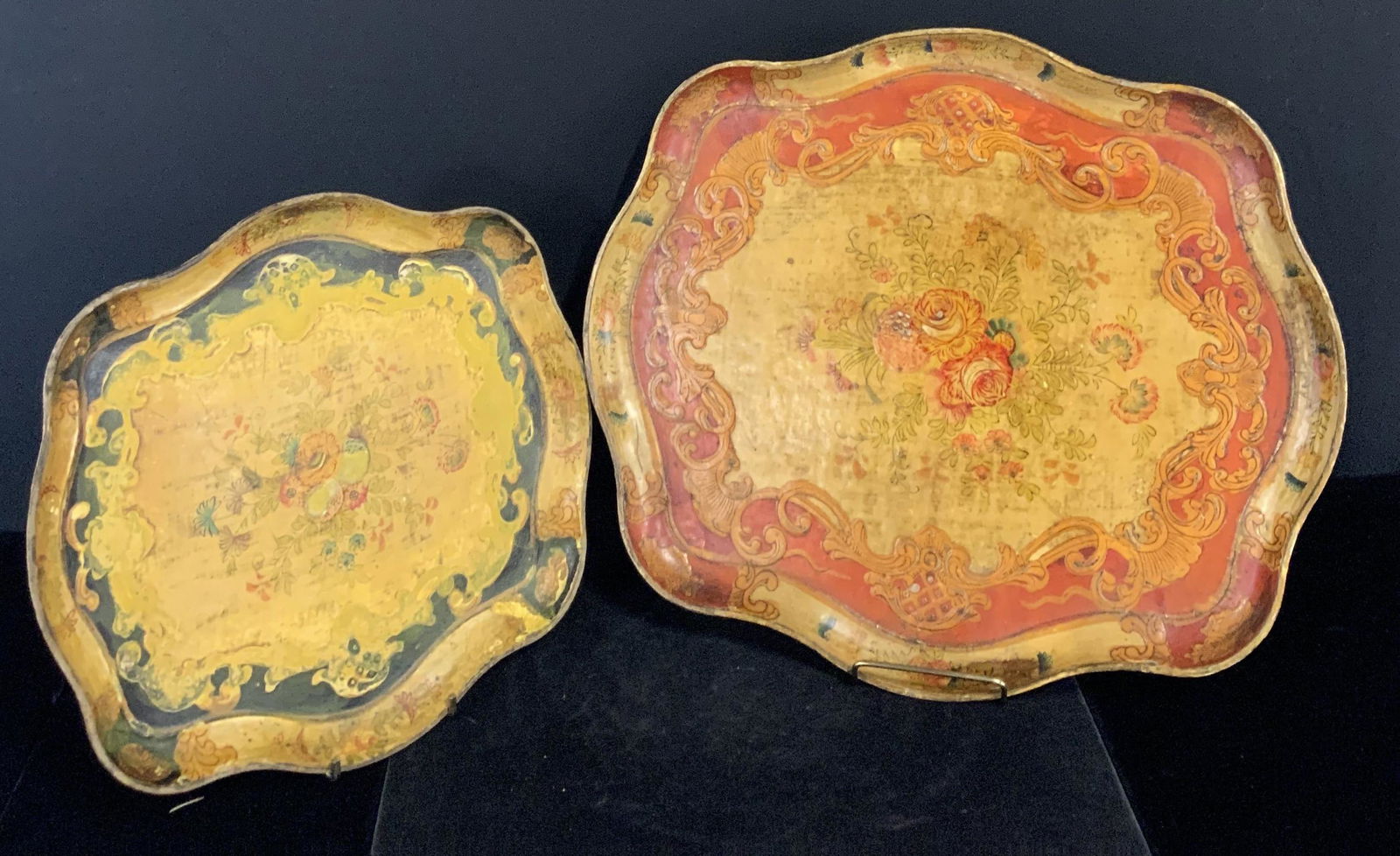 Pair Antique Signed Japanese Paper Mache Trays: Hand painted antique paper mache / papier-mâché trays. Trays feature floral designs in the center, roses, and smaller floral designs along the sides. Colorful reds, yellows, and blues. Underside rea