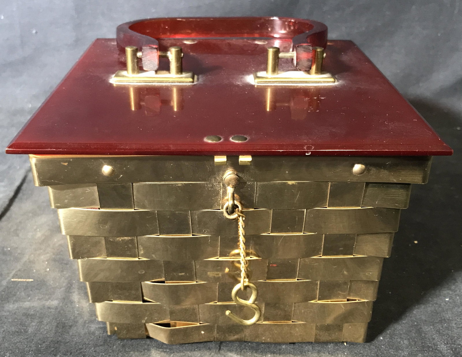 DORSET & REX Fifth Ave Decorative Metal Box: Dorset & Rex fifth ave decorative metal box, tag to interior reads ‘Dorset & Rex Fifth Ave’, subject a box of gold toned metal made to look like a basket, embossment to underside reads ‘9 pat 24