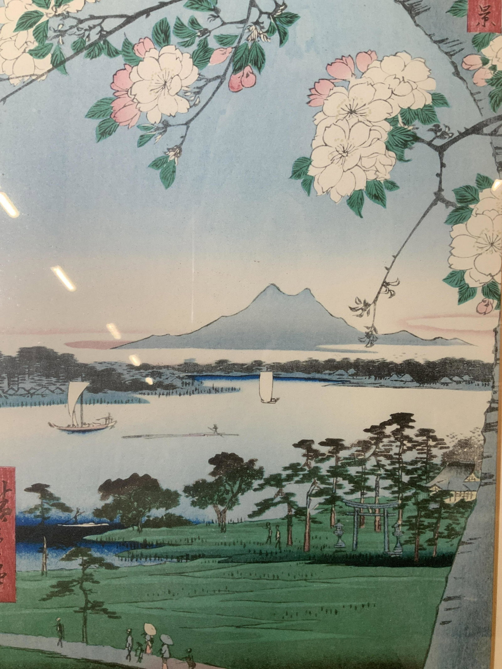 ANDO HIROSHIGE Suijin Grove & Masaki Woodblock: ANDO HIROSHIGE Suijin Grove & Masaki Woodblock, inscription to piece in Japanese characters, subject people walking alongside a body of water and mountain, measures 21 x 15 5/8 inches, wooden frame wi