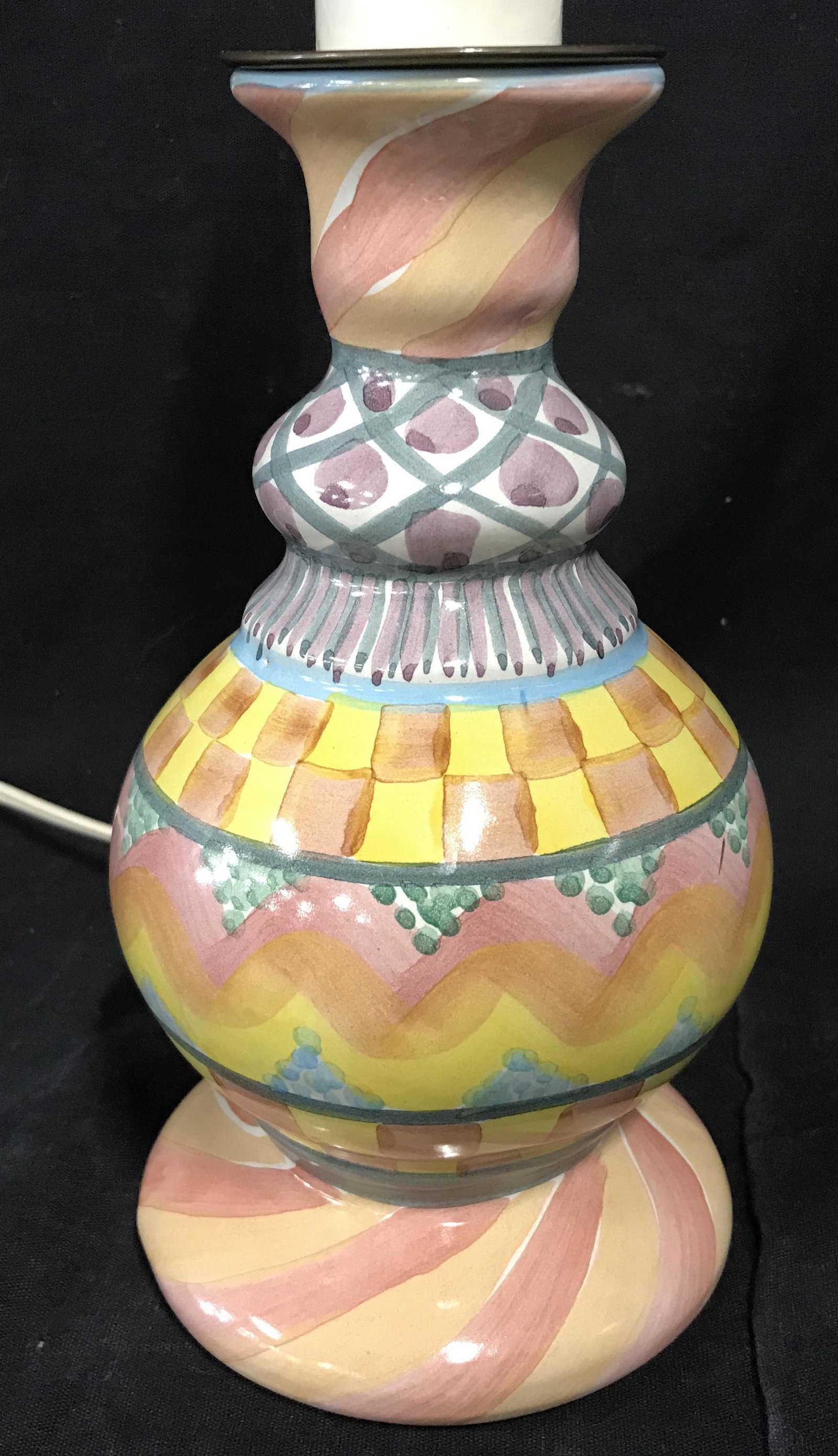 Vintage MACKENZIE-CHILDS Hand Painted Ceramic Lamp: Vintage MCKENZIE CHILDS hand painted ceramic lamp. Colored in multiple pastel colors. Underside reads as F 1996, M-C 1983. Lamp socket resembles a melting candle. Measures approx 14 inches H, and 7.5
