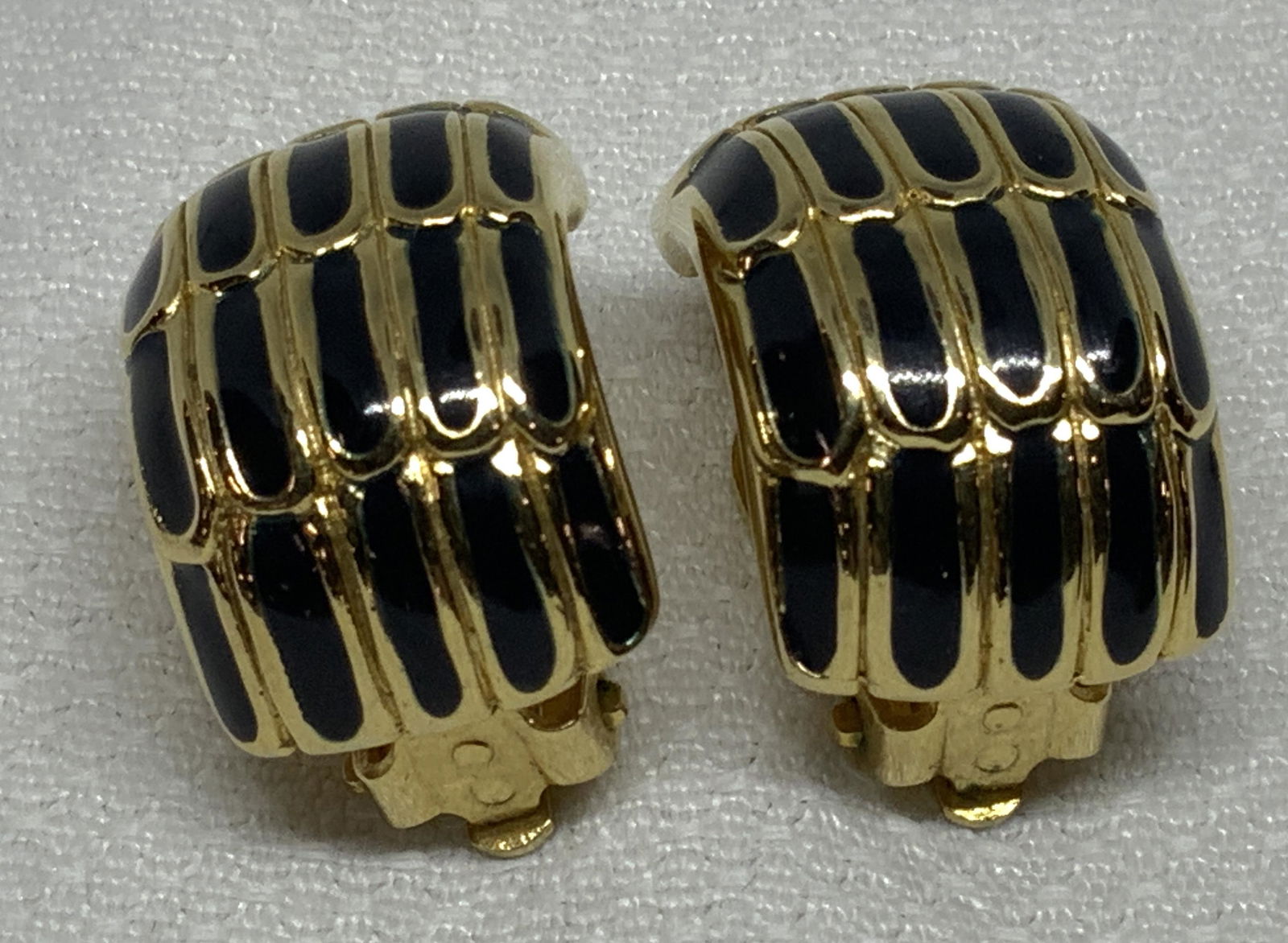 Signed ERWIN PEARL Enamel Earrings, Jewelry: ERWIN PEARL has been designing fashion accessories for women since 1952. He began his career as a diamond cutter and early on excelled in fine and fashion jewelry design. Gold toned and black enamel 1
