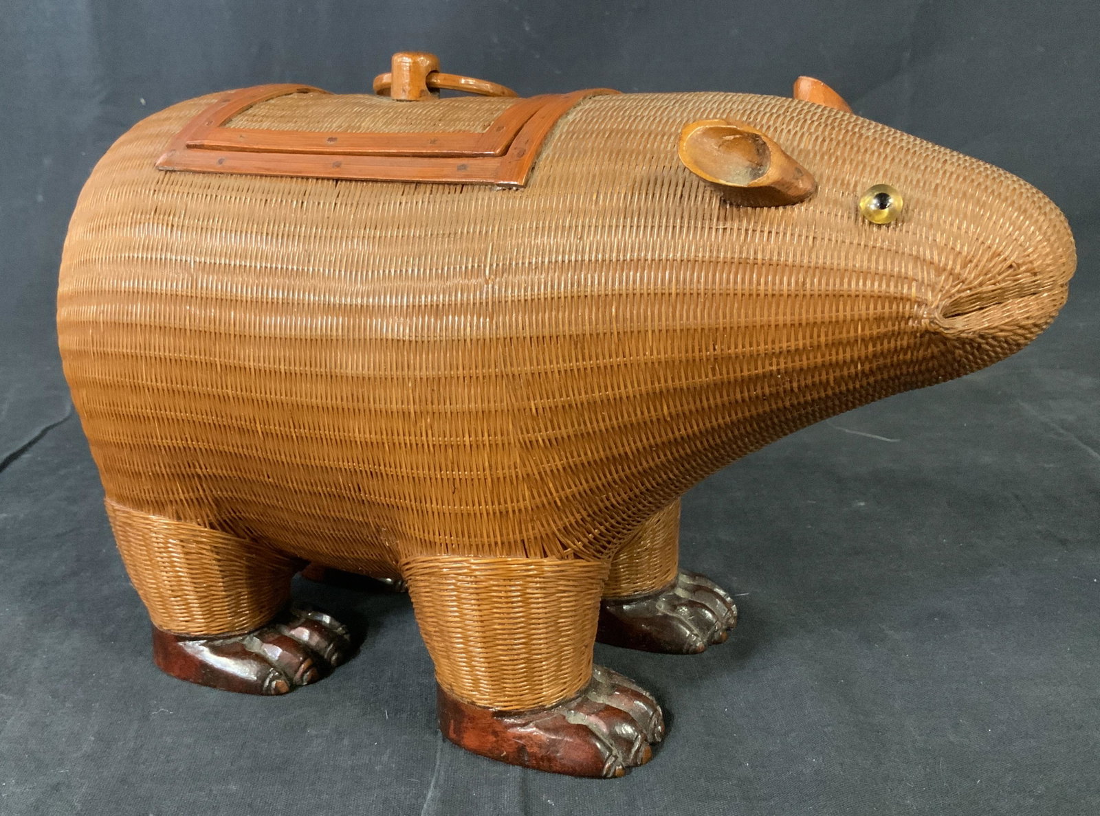 Abraham & Strauss Wicker Capybara Figural Vessel: Vintage Wicker Capybara Vessel, label to base reads ‘Abraham & Strauss #701’, a standing animal, measures 6 1/2 inches tall x 10 5/8 inches at widest point, needs cleaning but overall in good cond