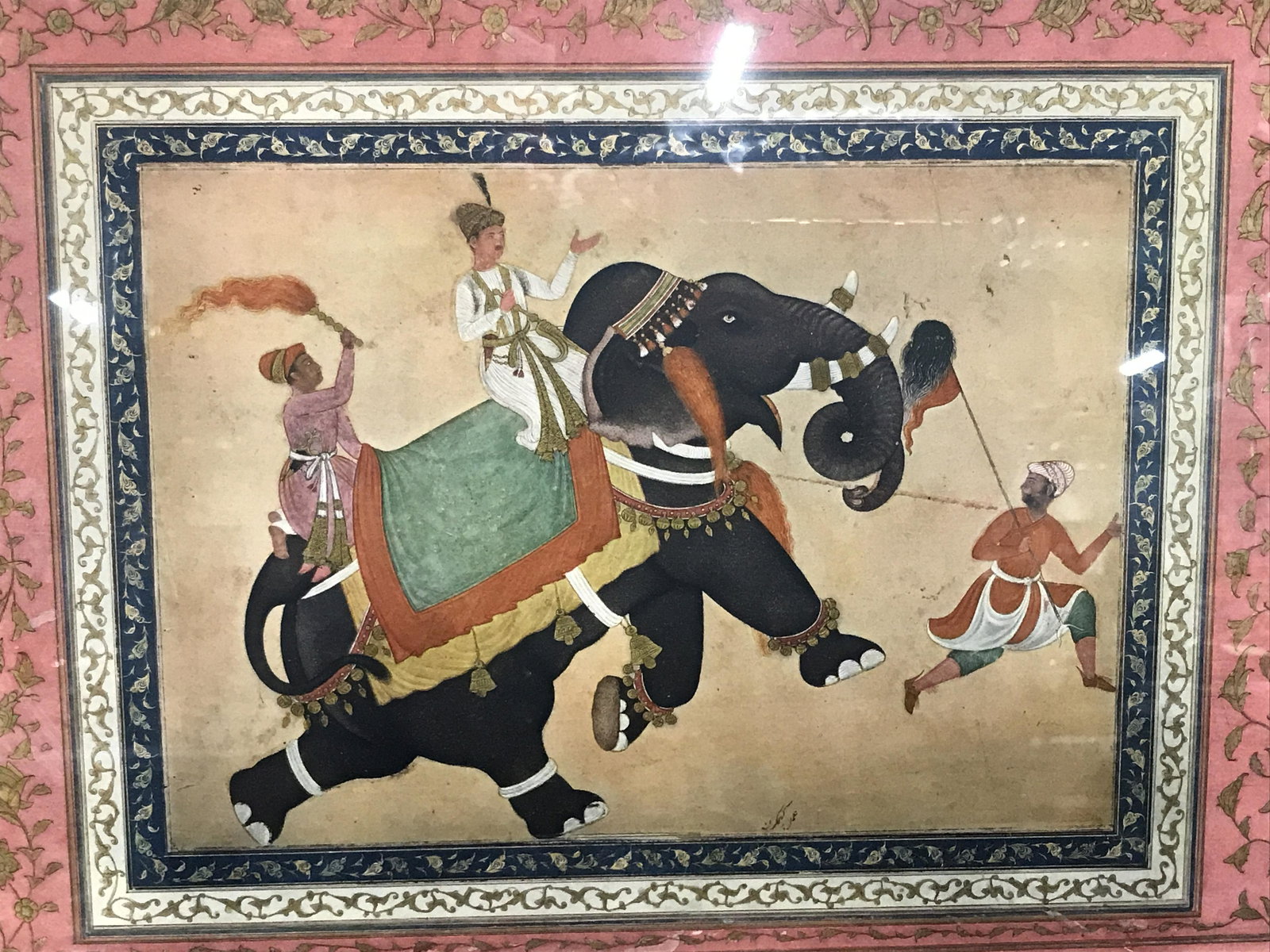 Metropolitan Museum Mughal Color Print Artwork: Metropolitan Museum Mughal color print, label to reverse reads ‘Metropolitan Museum Color Print’ and proceeds to give information on the piece as well as its history, subject a prince riding an el
