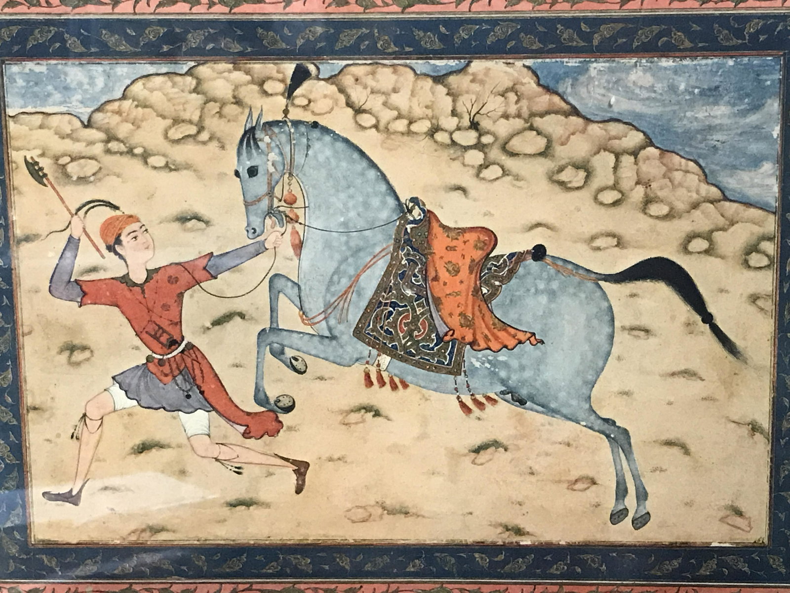 Metropolitan Museum Mughal Color Print: Metropolitan Museum Mughal color print, label to reverse reads ‘Metropolitan Museum Color Print’ and proceeds to give information on the piece as well as its history, subject a riding horse and ru