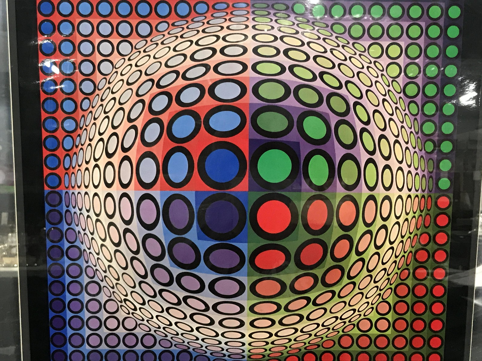 VICTOR VASARELY Offset Lithograph Artwork: Victor Vasarely offset Lithograph artwork, no apparent signatures or stamps, subject an op art piece depicting a sphere made of circles creating an optical illusion, black matting, mirror silver toned