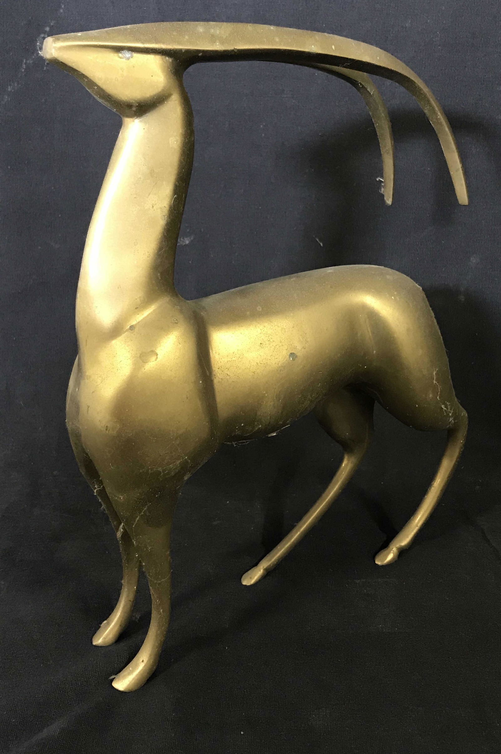 DARA Art Deco Style Brass Gazelle Figural, KOREA: Art Deco Style gazelle style. Measures approx 9.25 inches H, 7.75 inches W. Label on underside reads as DARA INTERNATIONAL ACCESSORIES LTD, MADE IN KOREA. Wear is consistent with age and use. Art Deco