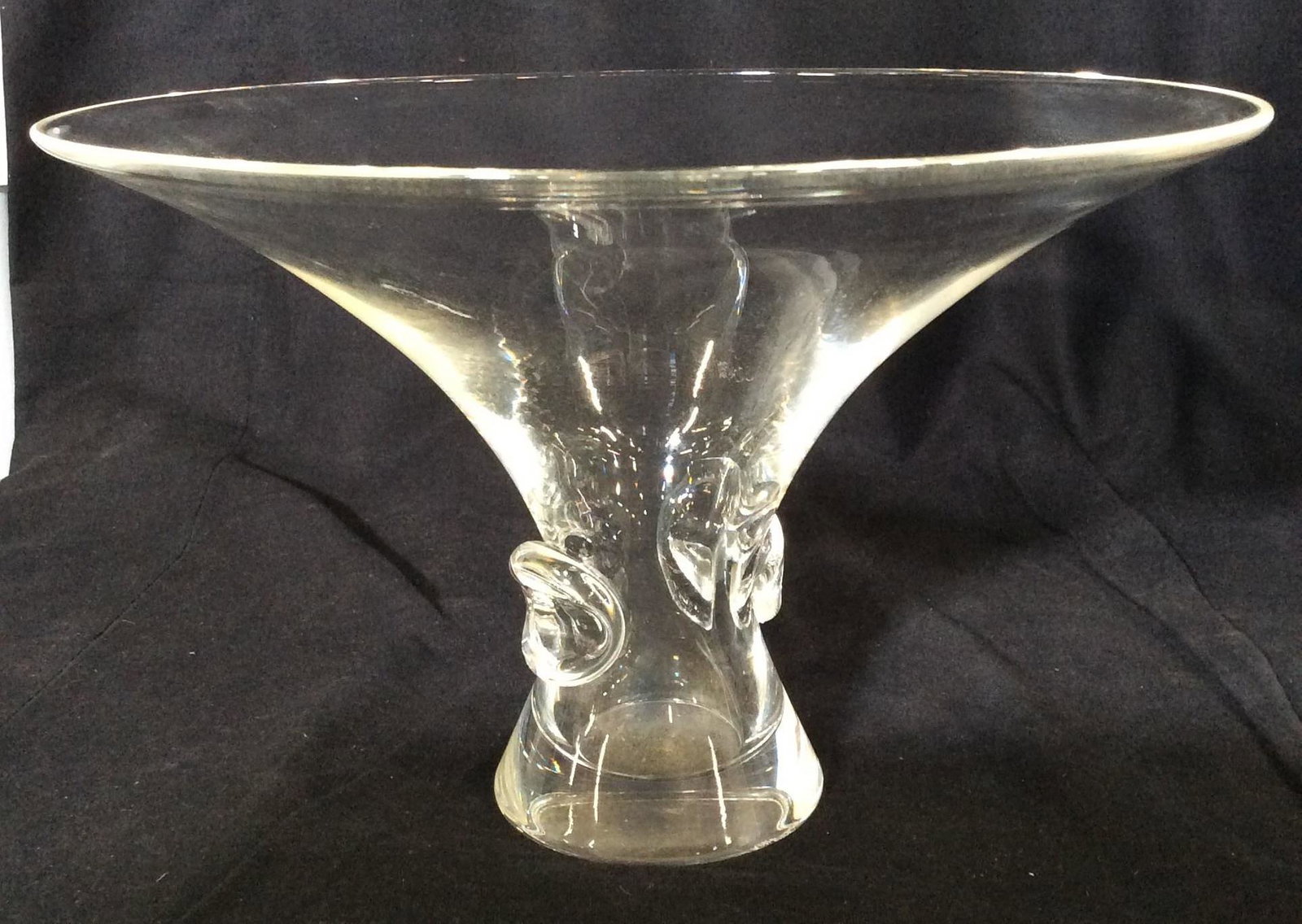STEUBEN Signed Vntg Trumpet Crystal Vessel: Signed Steuben Crystal Vessel. Shaped like a Trumpet. App 10 in diameter, 6.5 in. Ht. Hand signed on base. Steuben Crystal was founded in 1903 in Steuben County, NY. Their crystal line began in 1933.