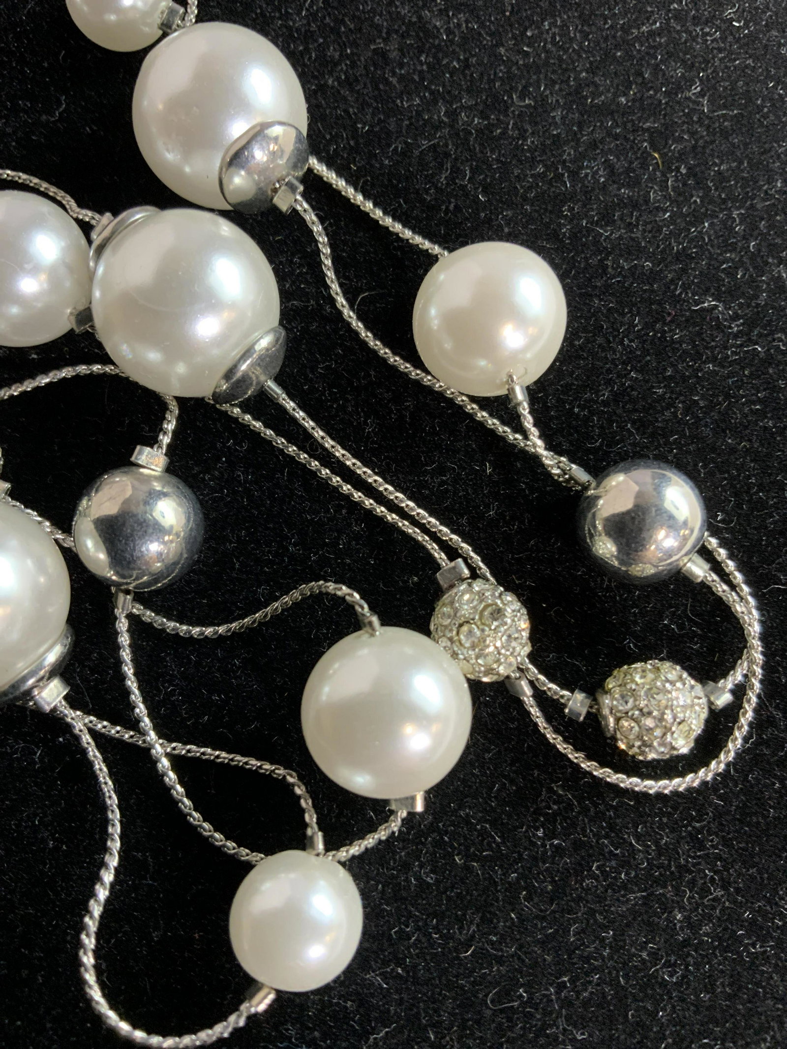 ANN TAYLOR Costume Pearl & Crystal Rope Necklace: Classic 1920s Flapper Style Necklace in silver tone with large size costume pearls and silver orbs every couple of inches on a 78 in. length necklace. Many styles to wear. Signed charm reads Ann Taylo