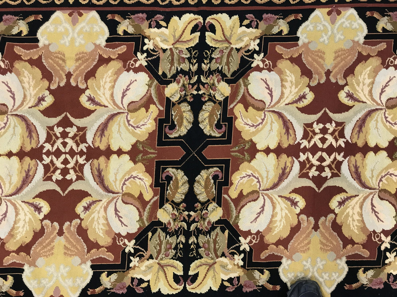 Vintage Handmade Wool Area Rug: Vintage area rug. Needlepoint, art nouveau style pattern decorated carpet. Appears to be hand made. Measures approx 114 Inches long, 67 inches W. Wear is consistent with age and use. Carpets, rugs, ho