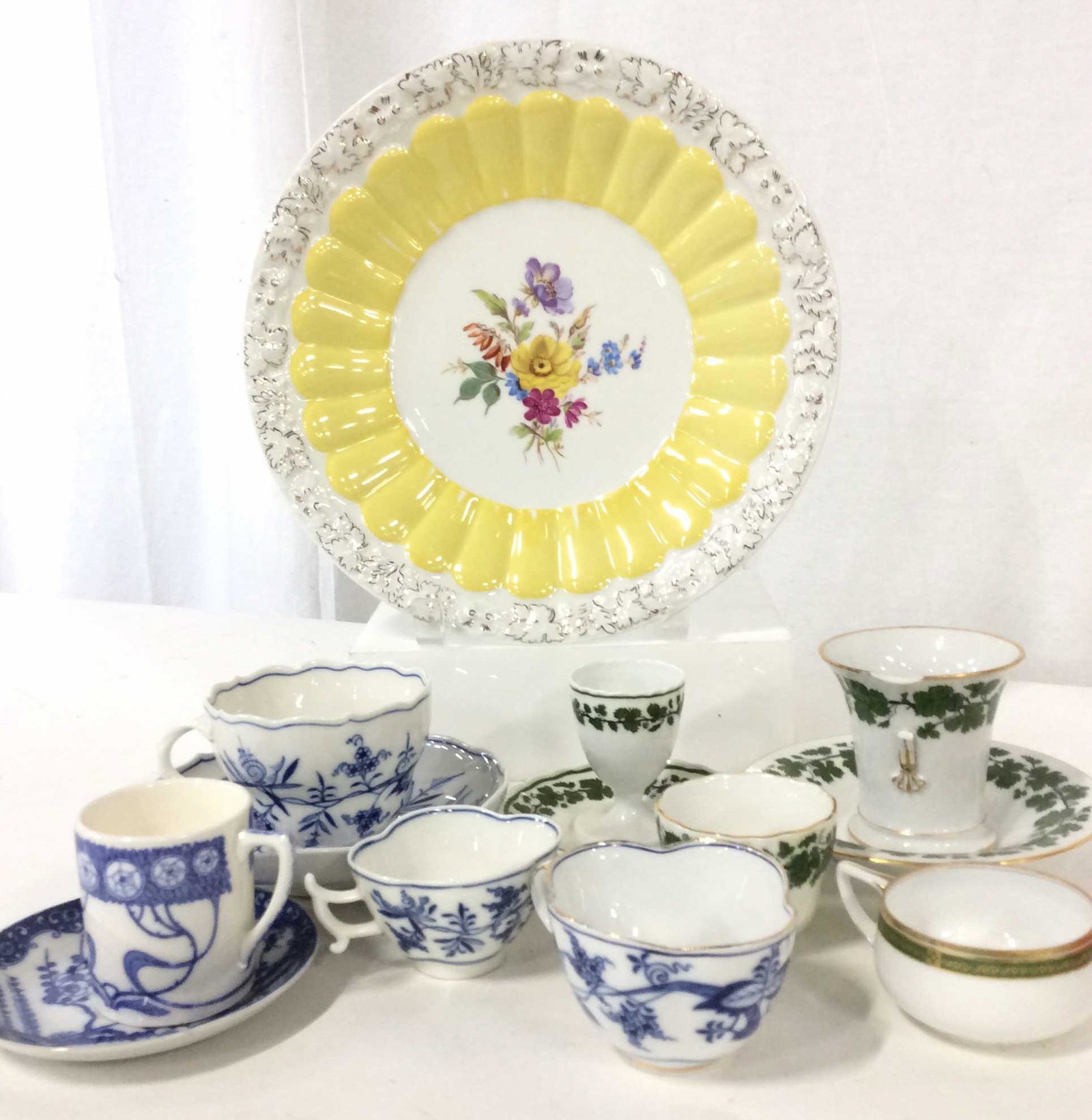 Lot Luxury Vintage MEISSEN Porcelain Dishes: Many items of Meissen and other European Porcelain. Hallmarked with Swords with ‘x’. 10.5 in Dresden Meissen yellow and white Flower Plate. Gild lining on embossed oak leaf pattern. Grape Leaf Vin