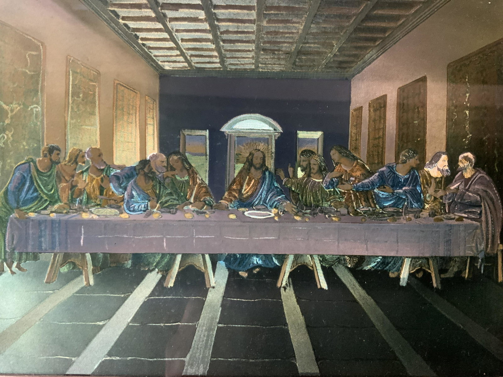 DA VINCI The Last Supper Foil Lithograph: DA VINCI The Last Supper Foil Lithograph, no apparent inscriptions or signatures, not examined out of frame, subject Jesus and the apostles sitting around a table, measures 10 1/8 x 13 inches, wooden 