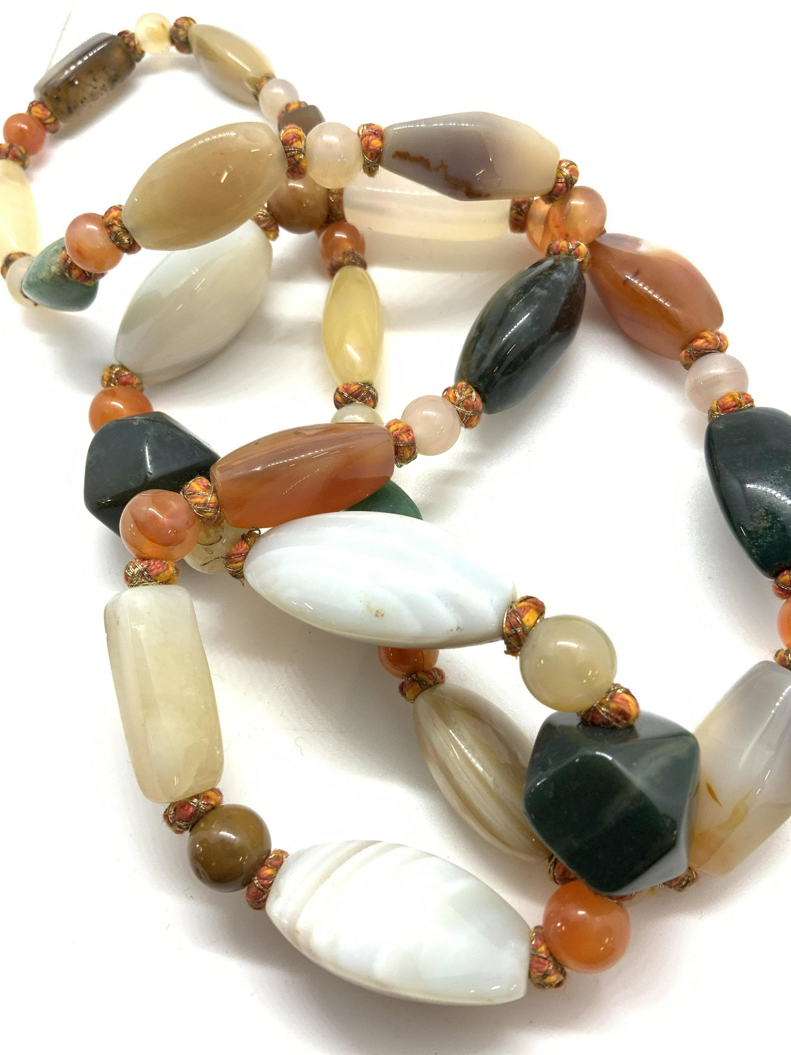 Natural Polished Quartz Necklace: Natural Stones, possibly carnelian, agate, sunstone, more. All polished into natural shapes or geo shapes. 16 in. Drop, hand strung, has weight. Mixed Natural Stone Necklace, Quartz Stone Necklace, Po