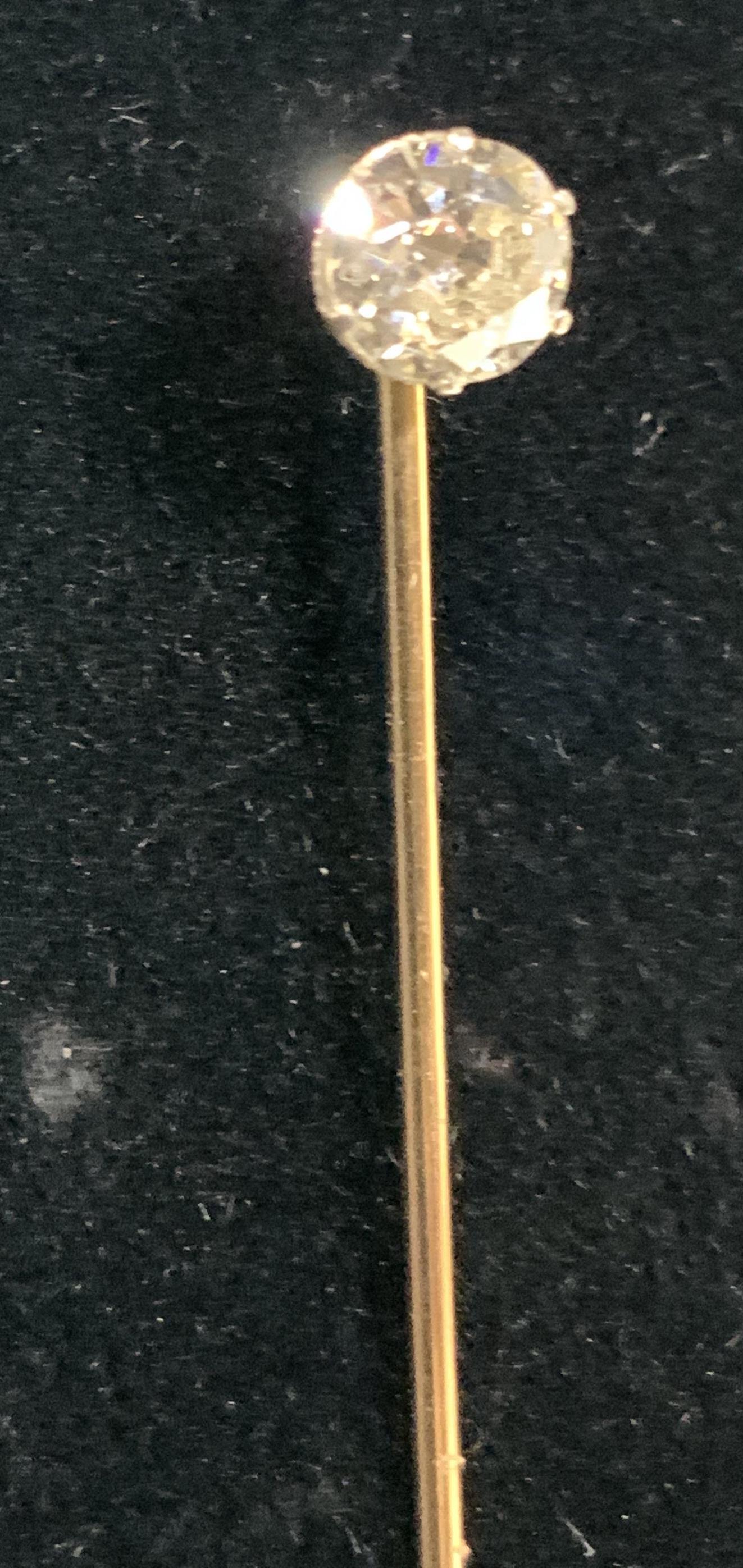 ANTIQUE DIAMOND 14 K GOLD Stick Pin: Brilliant Cut Round Solitaire DIAMOND quite sizable at app 5.5 mm with beautiful clarity and color by sight. 6 prong setting, topping a 14 k yellow gold stick pin. This is an antique piece, the gold i