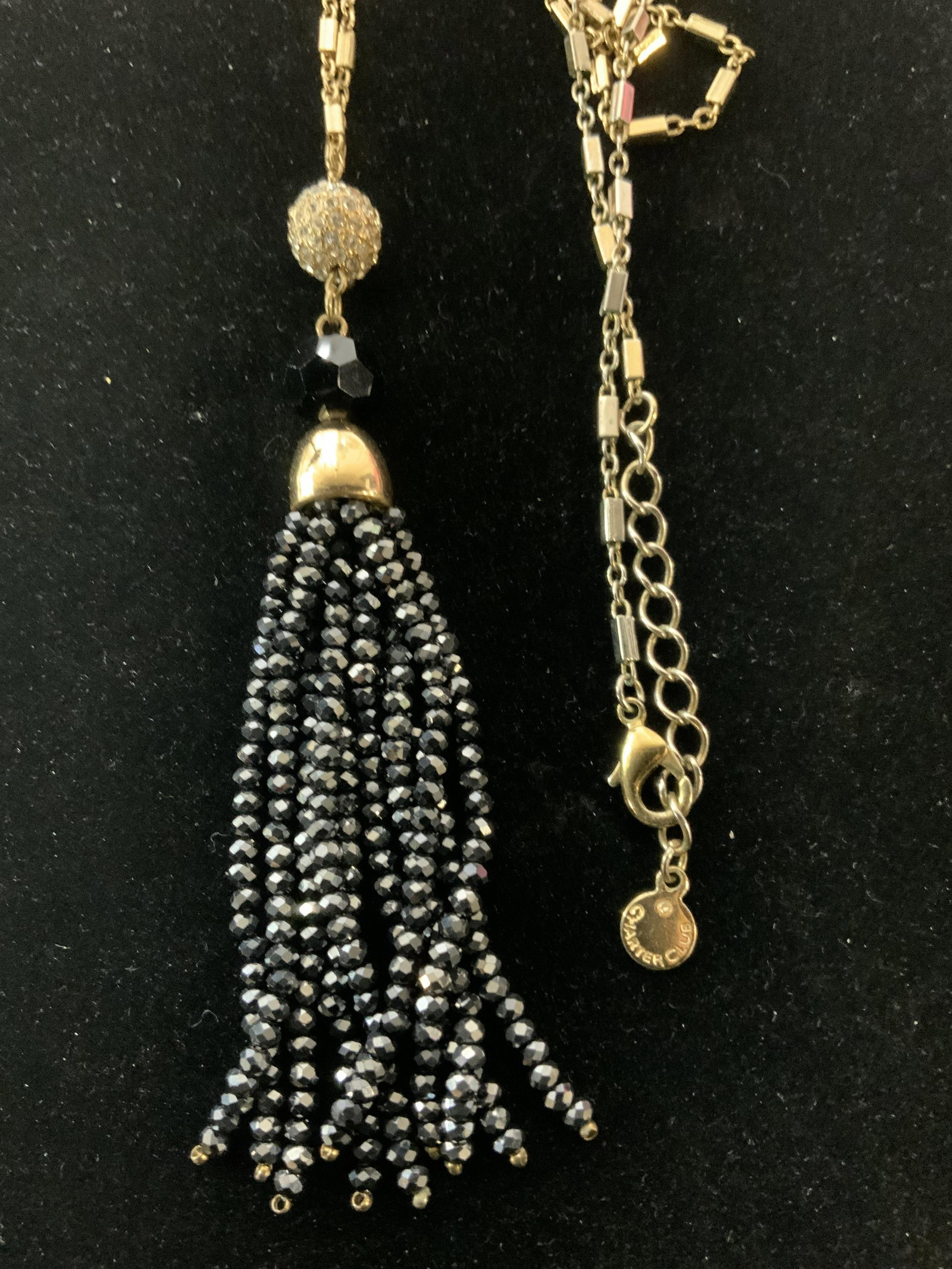 CHARTER CLUB Tassel Bead Pendant Long Necklace: Signed Charter Club jewelry on charm, long chain, 34 in. Crystal sphere ball leads to iridescent gun metal beaded tassel pendant, length 4.5 in. Charter Club Fashion Tassel pendant Necklace, tassel je