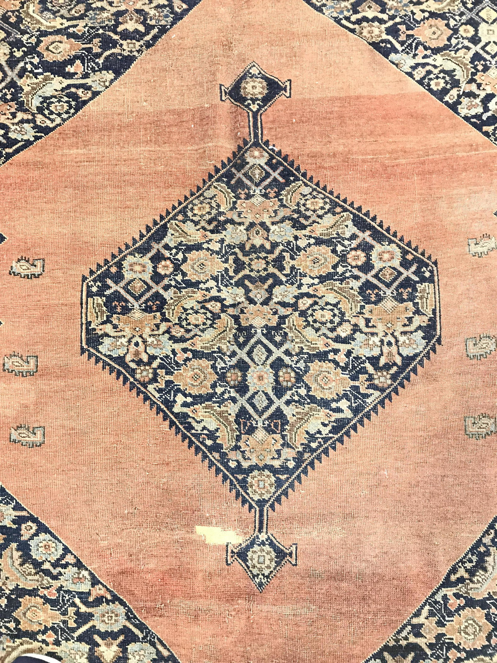 Vintage Handmade Room Size Wool Rug: Rug is wool and handmade. Piece is vintage possibly antique. Rug has intricate multi toned floral leaf vine & geometric detail. Rug , carpet, area rug, wool rug, handmade rug, floral rug, vintage rug.