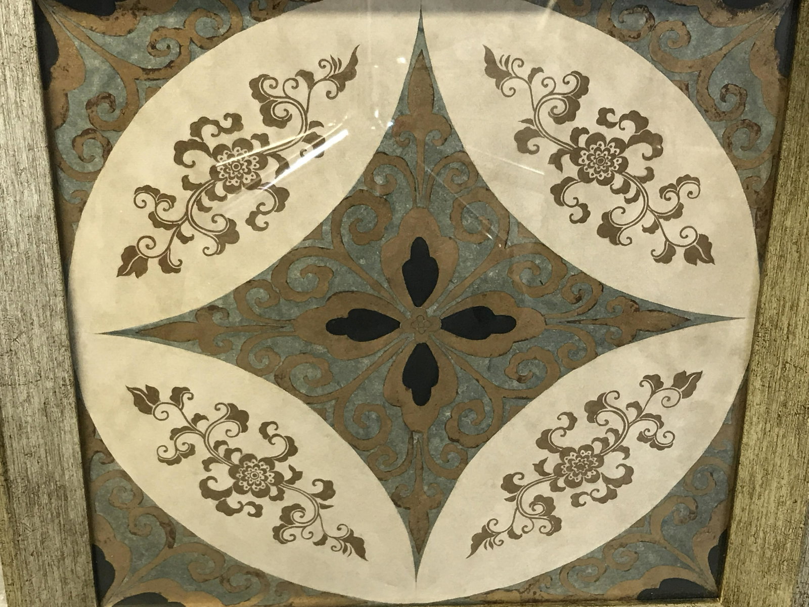 Hand Painted Floral Baroque Design Artwork: Hand painted Floral baroque designs, subject a gold and blue painted star like pattern with floral designs throughout, gold painted wooden frame, measures as a 17 inch square frame, not examined out o