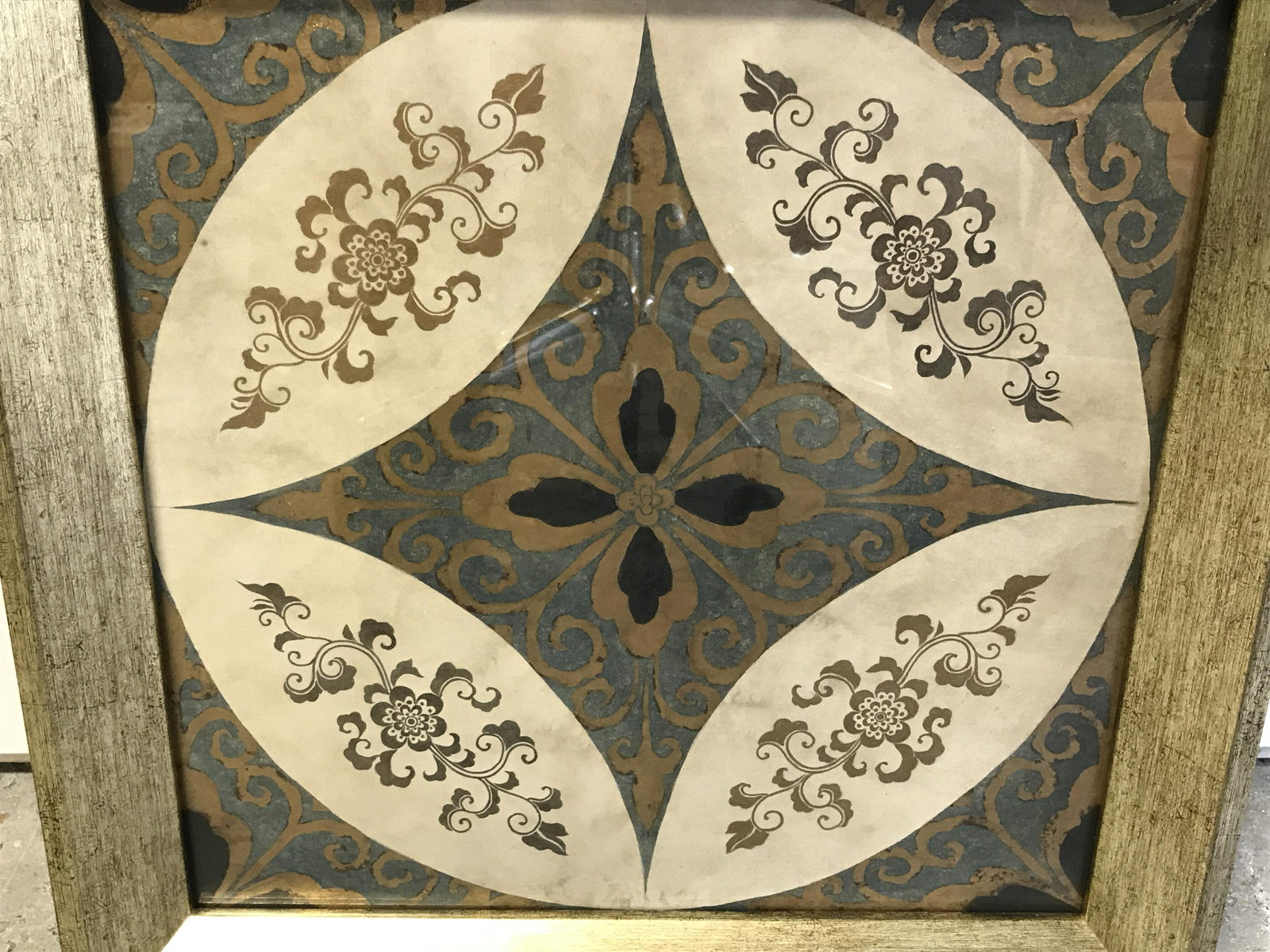 Hand Painted Floral Baroque Design Artwork: Hand painted Floral baroque designs, subject a gold and blue painted star like pattern with floral designs throughout, gold painted wooden frame, measures as a 17 inch square frame, not examined out o