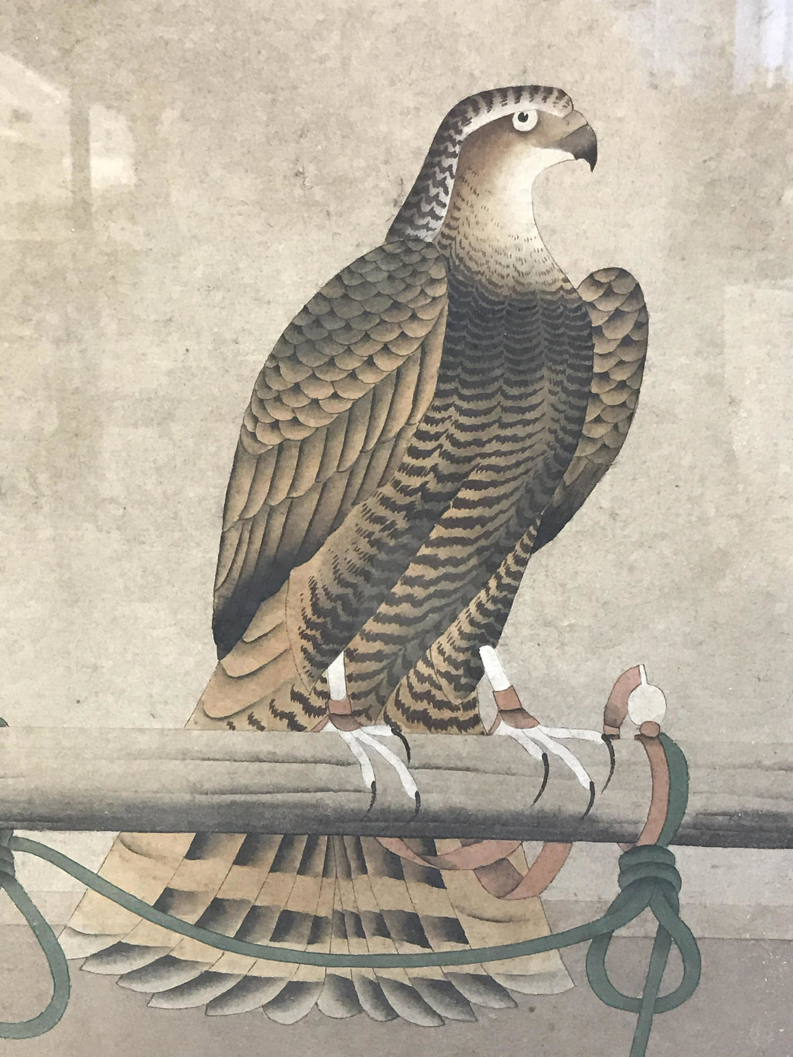 Signed Chinese Hand Painted Bird Artwork: Chinese Hand Painted Bird, red Chinese character stamp to center left section, subject a bird of prey perching on a pole with ropes twisted round it, matte black wooden frame, measures 36.5 inches tal
