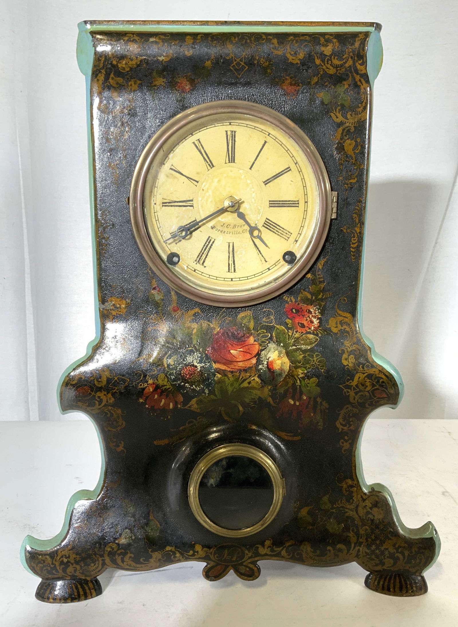 Antique JC BROWN painted Tole Metal Clock: Vintage possibly antique metal clock, mantle clock, black metal base with painted florals gilt swirls vines and leaves, aqua and green toned trimming, not tested for working condition, face of clock r