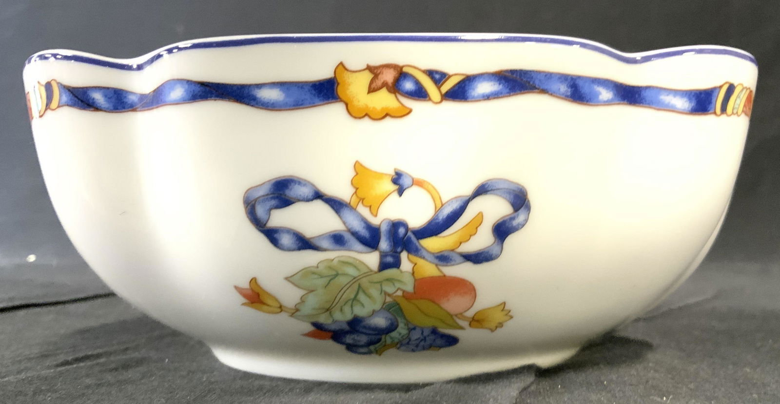 Bernardaud LIMOGES French Porcelain Serving Bowl: labeled on underside Bernardaud LIMOGES France. 'Borghese' pattern white porcelain bowl with ribbon fruit and leaf design. Scalloped edge, Luxury French porcelain tableware, Bernardaud French Limoges