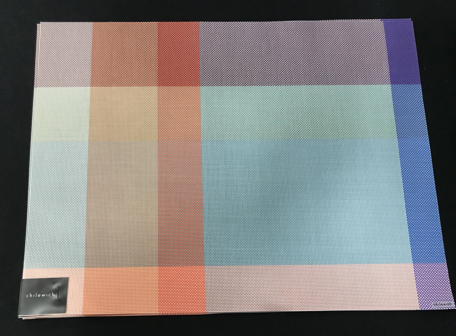 Group New Merchandise Donated by Chilewich: Group lot of new and packaged merchandise donated by Chilewich, group lot includes 54 place mats, each item new in wrapping, perfect for holiday gifts, proceeds from the sale of this item will be dona