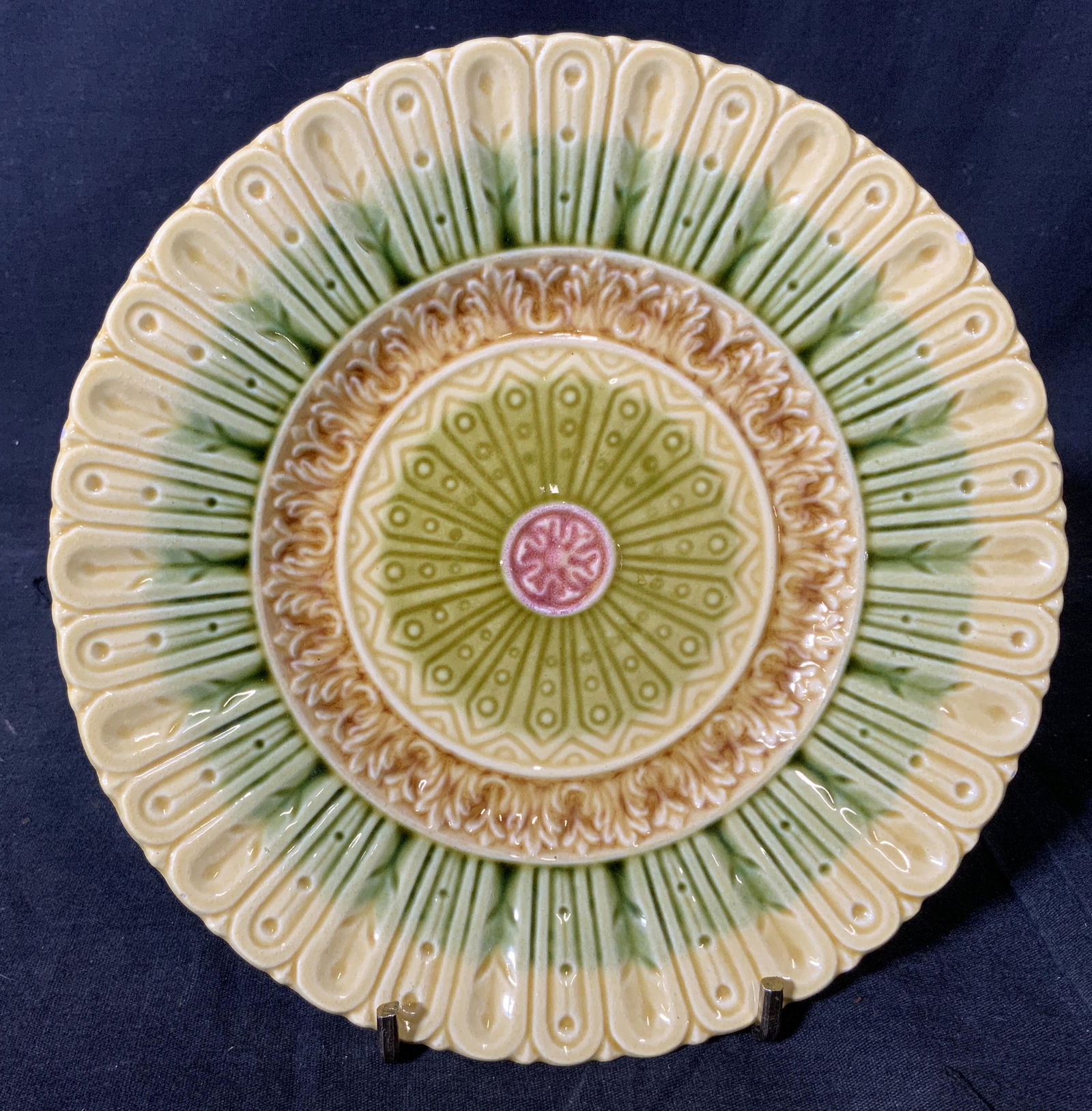 BLACK FOREST ART POTTERY Painted Plate, Germany: Black Forest art pottery painted plate, stamp to reverse reads ‘Black Forrest Art Pottery — Germany’, front of plate displays a floral design, plate painted in yellows and greens with a brown ce