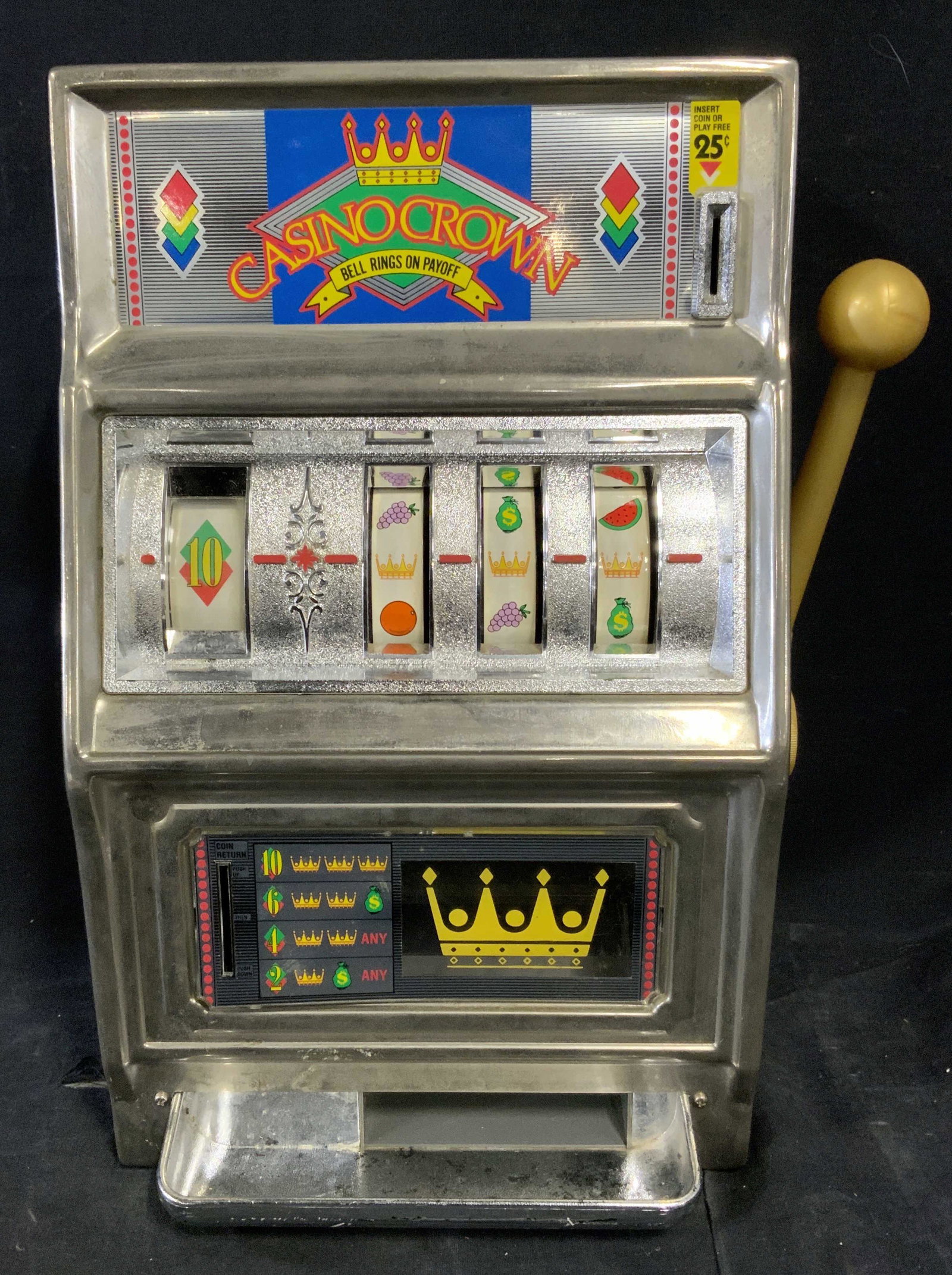 Vintage Waco Casino Crown Slot Machine: Vintage Waco Casino Crown Slot Machine, text to front of machine reads ‘Casino Crown Bell Rings on Payoff’, label to reverse reads ‘Waco Product of Japan’, subject a silver metal slot machine 