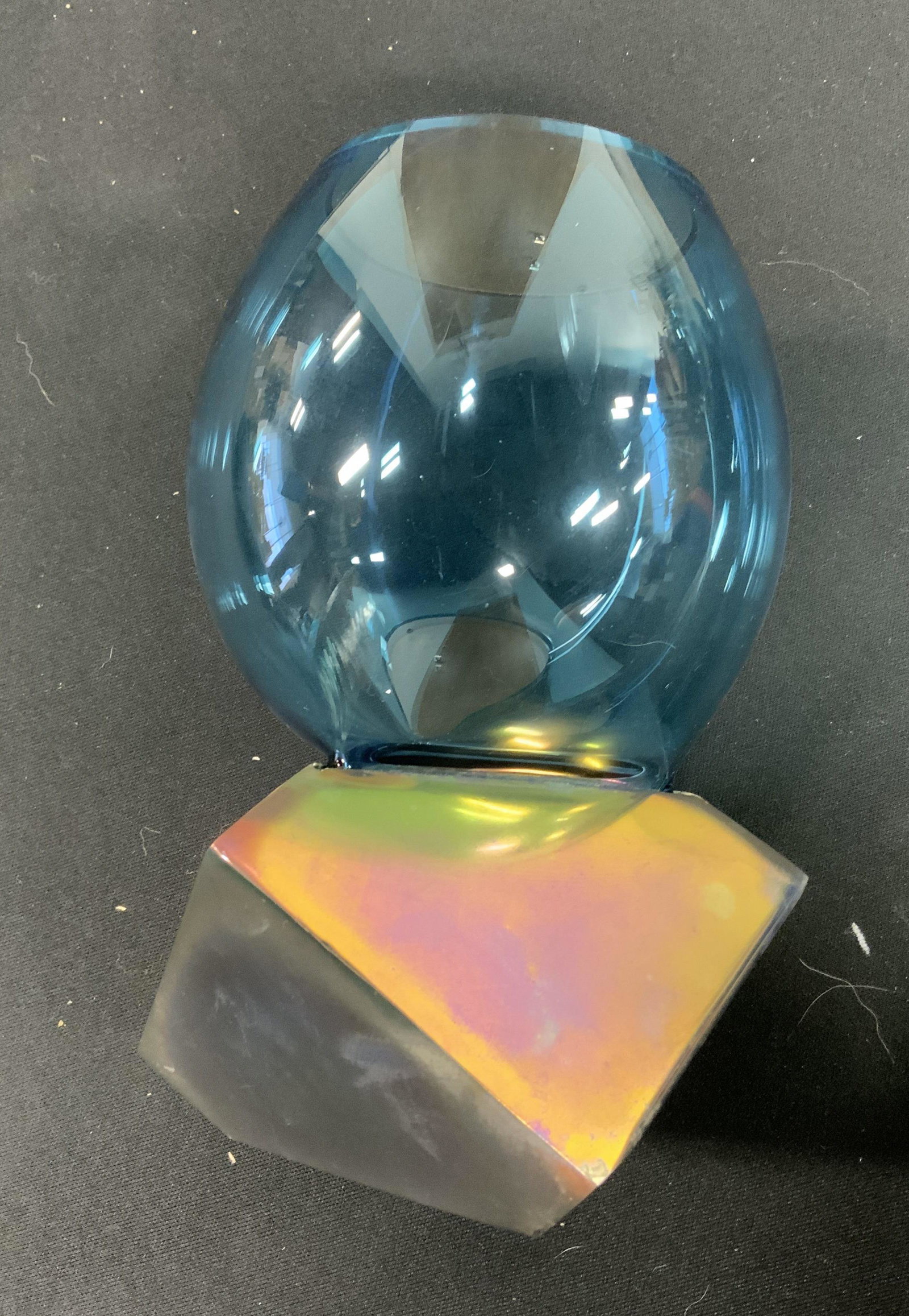 CURATED KRAVET Abstract Art Glass Vase: Underside has tag which reads CURATEDKRAVET.COM. Piece is cart glass. Vase has various blue tones & attract geometric shape. Piece measures approximately 9 inches tall. Vase, Kravet vase, Kravet decor