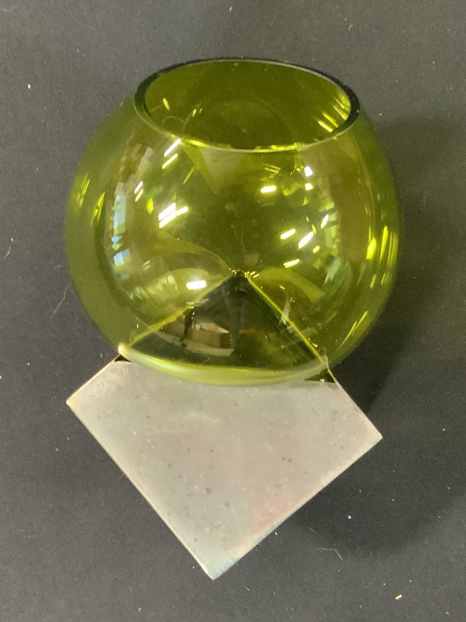 CURATED KRAVET Abstract Art Glass Vase: Underside has tag which reads CURATEDKRAVET.COM. Piece is cart glass. Vase has various green tones & attract geometric shape. Piece measures approximately 9 inches tall. Vase, Kravet vase, Kravet deco