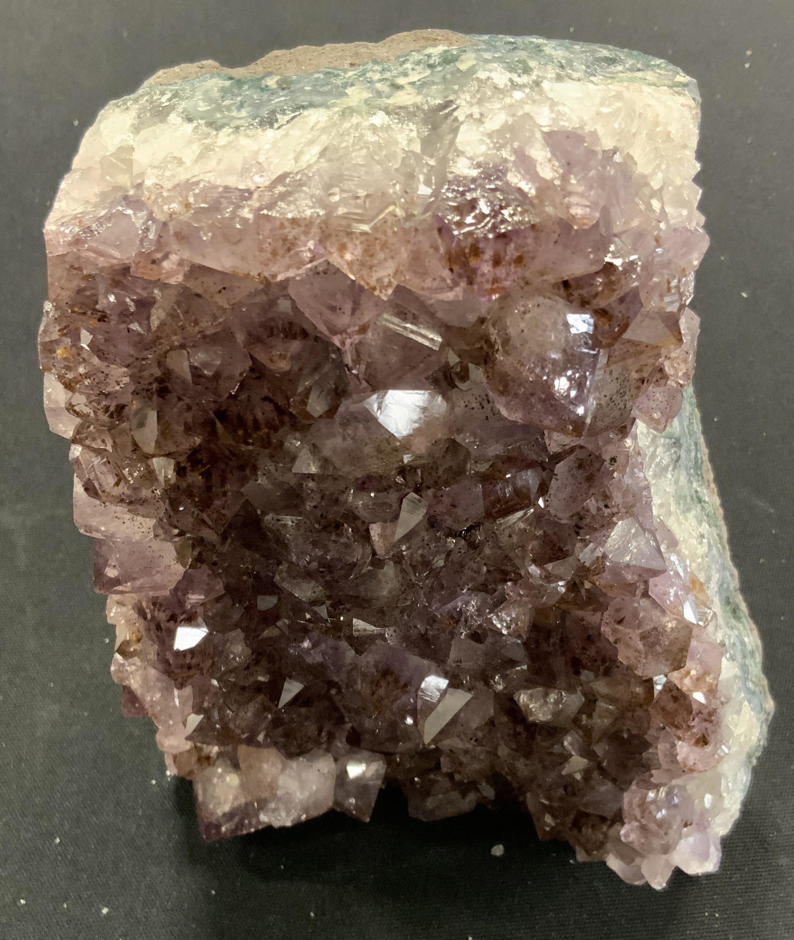 CURATED KRAVET New Large Purple Quartz Geode: New and packaged merchandise donated by Curated Kravet, lot includes a large purple Quartz crystal geode, colors to geode include purple at the top with layers of white and blue, items new in wrapping