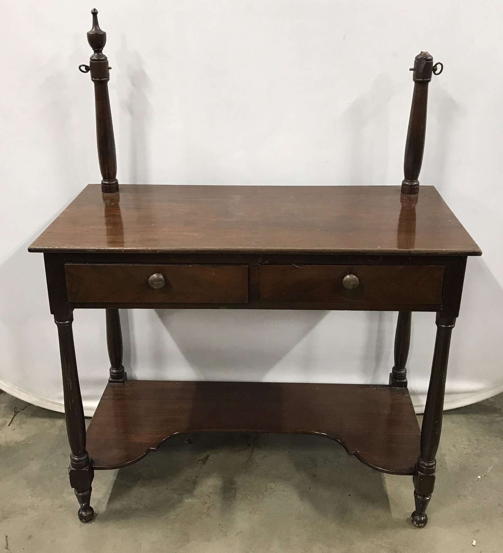 Vintage Wood Dressing Table: Vintage dressing table, rafted from wood. Tilt mirror is absent, drawer joints are dovetailed. Right finial is damaged and need replacement/reattachment. Wear is consistent with age and use. Vintage f