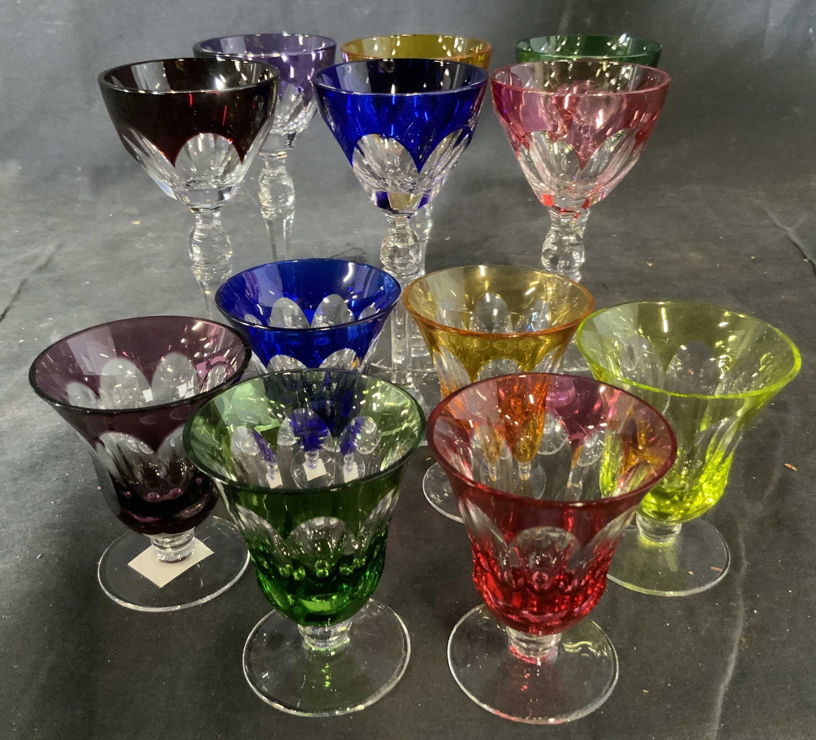 Set 12 Bohemian Glass Crystal Stemware: Multi colored bohemian glass, purple, blue, yellow, green, claret and pink, orange, six tall measure 5,5 inches ht and six cordials ht 3 inches, bar ware, table ware, goblets, wine glasses, stemware,