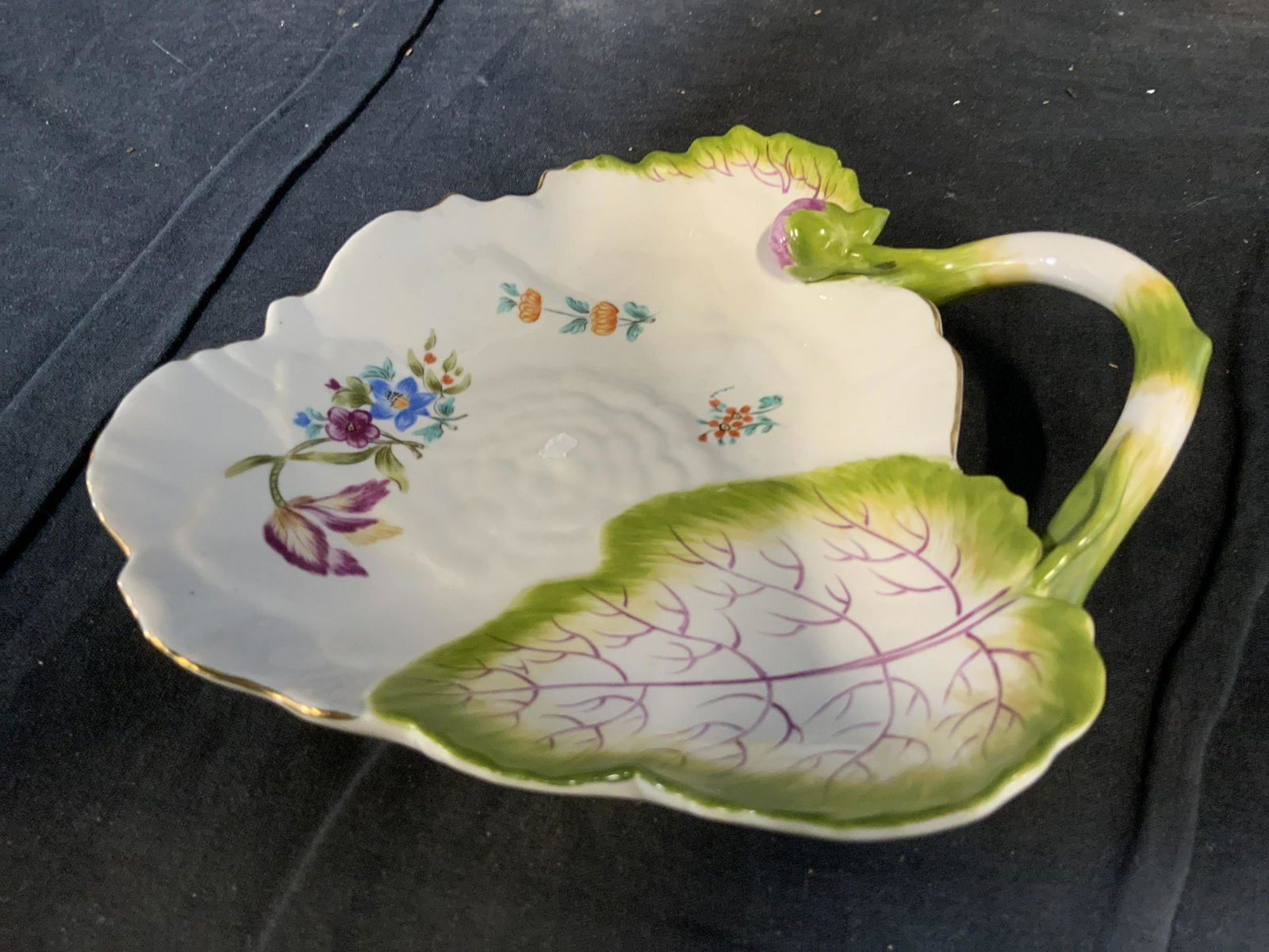 MOTTAHEDA Porcelain Leaf Plate: Pink green white porcelain plate, decorative accessory, nut dish, partial label underside for MOTTAHEDA , Luxury table ware, measures 7 by 8 inches, ht app 2.5 inches