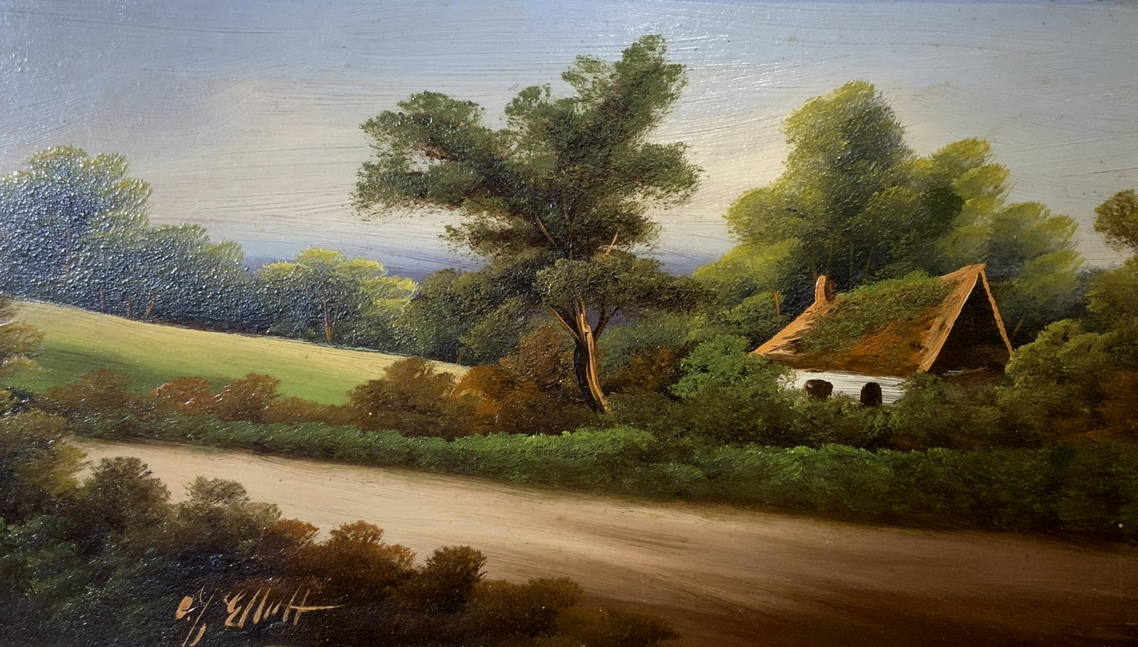 ELLIOT Signed Oil on Board Landscape: Elliot signed oil on board landscape, signature to the lower left section reads ‘Elliot’, subject a landscape with a dirt road and home in the background, highly ornate hand carved gilt wood frame