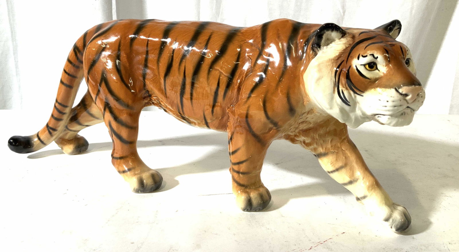GOEBEL vintage large Bengal Tiger Figural: Porcelain ceramic Walking Tiger Figural, early GOEBEL , porcelain tiger Figural, jungle cat, decorative arts, decorative accessory, measures ht 8 inches length 19.5 inches depth app 5 inches, possible