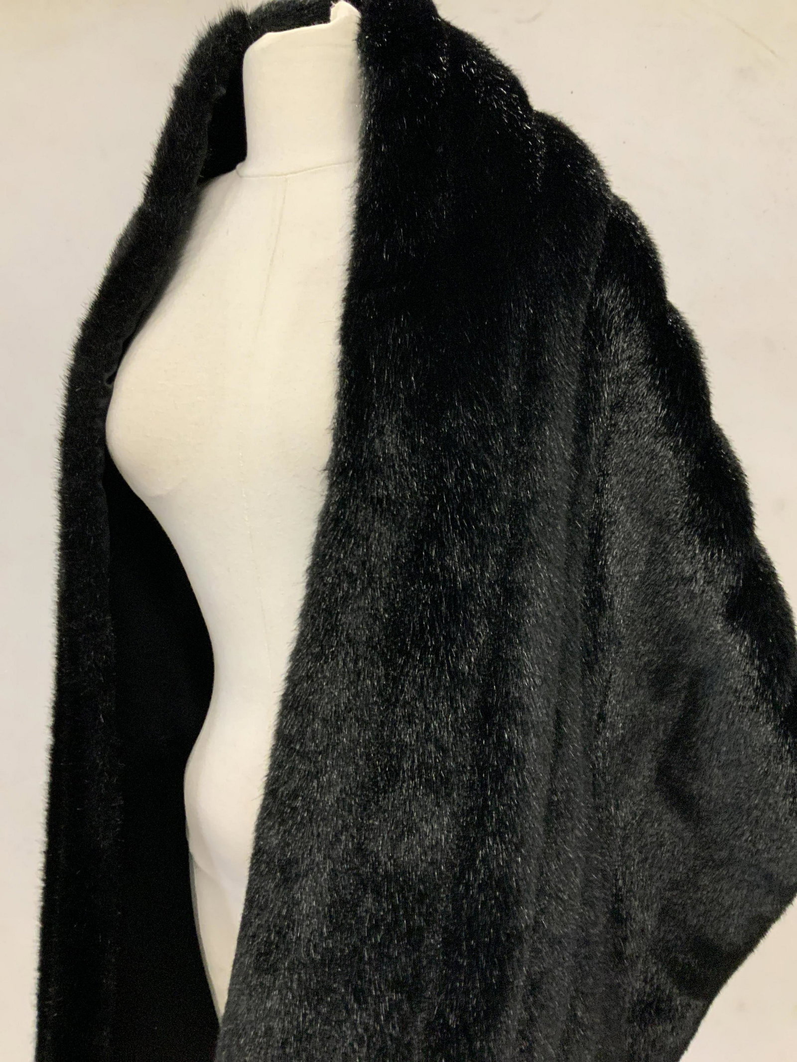 LORD & TAYLOR Plush Heavy Ladies Wrap: An exclusive Lord & Taylor Black Plush Wrap/ Cover/ shawl. 86% acrylic , 14% polyester, made in Korea, Dry clean only. 18 in. W x 68 in. L. Weighted. Attached is original Lord & Taylor Label. luxury o