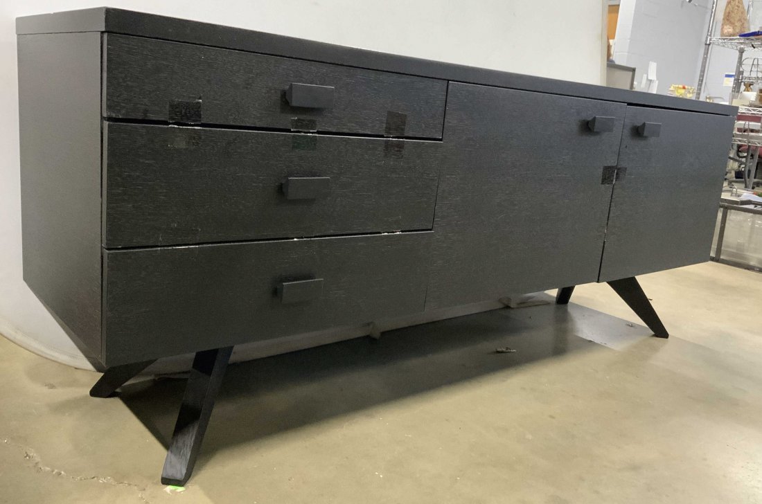 MATTHEW HILTON CASE FURNITURE Credenza: Backside of piece is labeled CASE FURNITURE DESIGNER MATTHEW HILTON. Piece is black toned and appears to be wooden. Originally from DESIGN WITHIN REACH. Credenza contains 3 drawers & 2 cabinet storage
