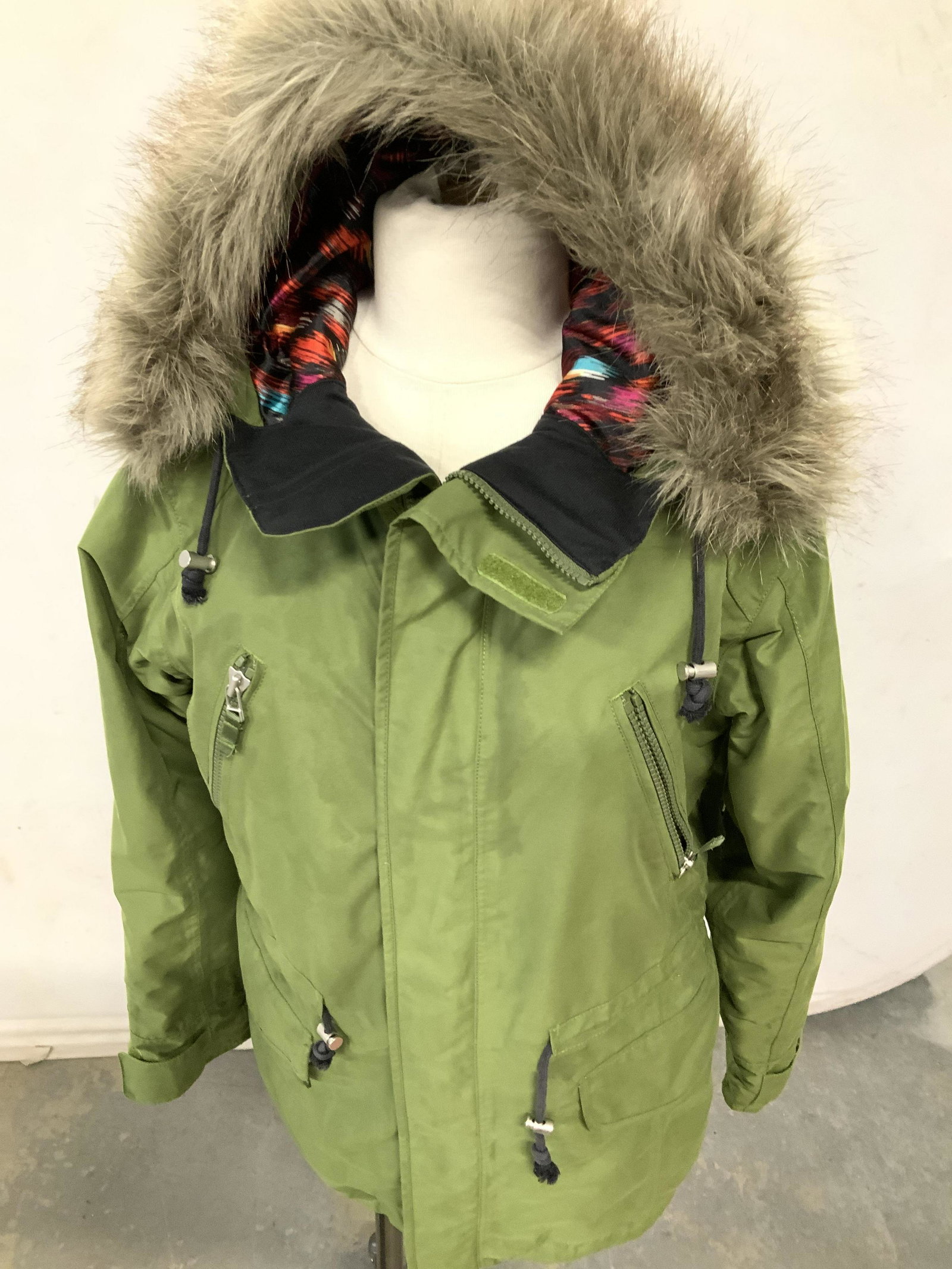 B by BURTON Puffer Winter Jacket, Ladies: B by Burton DRY RIDE Winter Jacket with hood. Size Small. Bright green color. Zipper and Velcro closure, plenty of zipper and Velcro pockets, cinch waist to prevent wind draft, Velcro sleeves, breatha