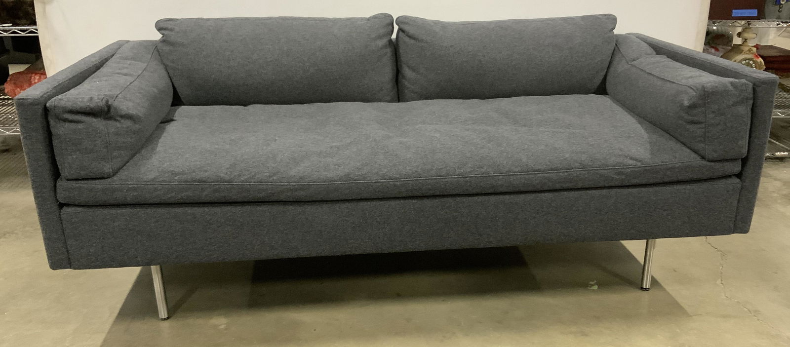 DESIGN WITHIN REACH Bolster Sofa: Upholstered two seated sofa. Long single seat cushion, back and arm cushions are removable, secured with zippers. Upholstery is heathered black in tone. Measures approx 29 inches H, 68 inches W, and 3