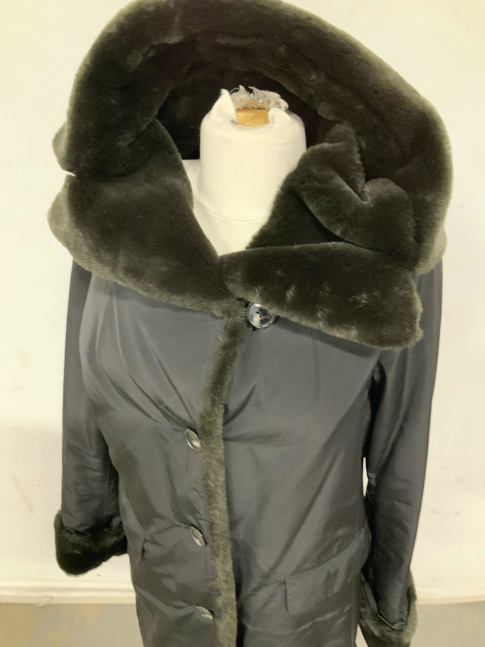 JANE POST Primaloft Plush Winter Rain Coat, ladies: Size Medium. 3/4 length hooded coat. Faux fur trim on cuffs, shawl collar, hood , and button area. Water resistant exterior polyester shell. Padded with primaloft and marked. Org designer label attach