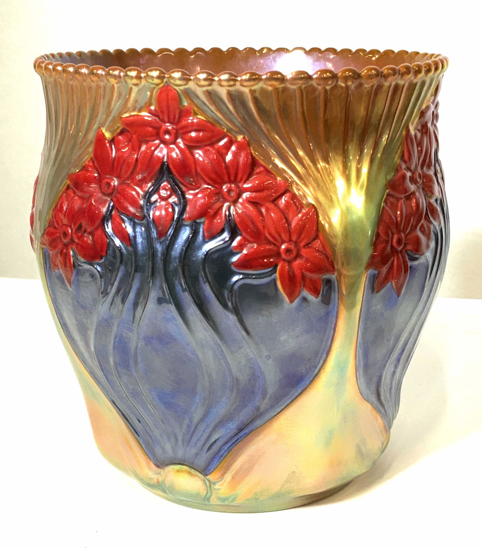 ZSOLNAY Trademarked Ceramic Vessel Hungary: Since 1833 ZSOLNAY has been providing the best quality hand painted porcelain items to Europe. This Arts & Crafts Era Vessel can be used as a planter, centerpiece, tabletop decor and more. Iridescent