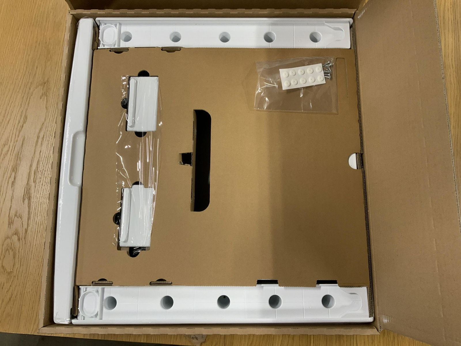 MIELE Laundry Stacking Kit: Box is marked MIELE. Piece is white toned. Measures approx 22 inches wide 24 inches long. Miele, Miele laundry stacking kit, laundry stacking kit, laundry accessories, Miele kit. 6