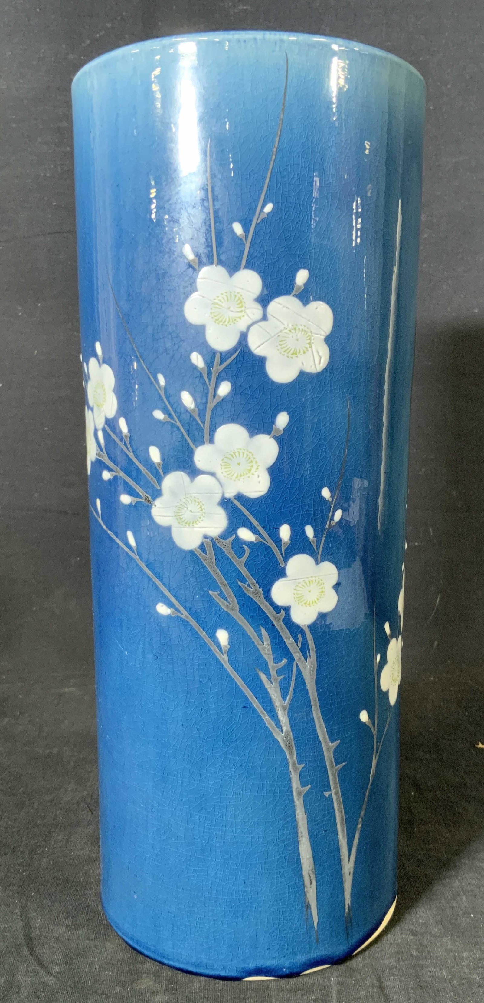 Marked Asian Style Ceramic Vase: Marked Asian Style Ceramic Vase, mark appears to be a bird, white Sakura design to exterior, measures 12 inches tall x 4 7/8 inches in diameter, some minor losses to glaze at rim but overall in good c