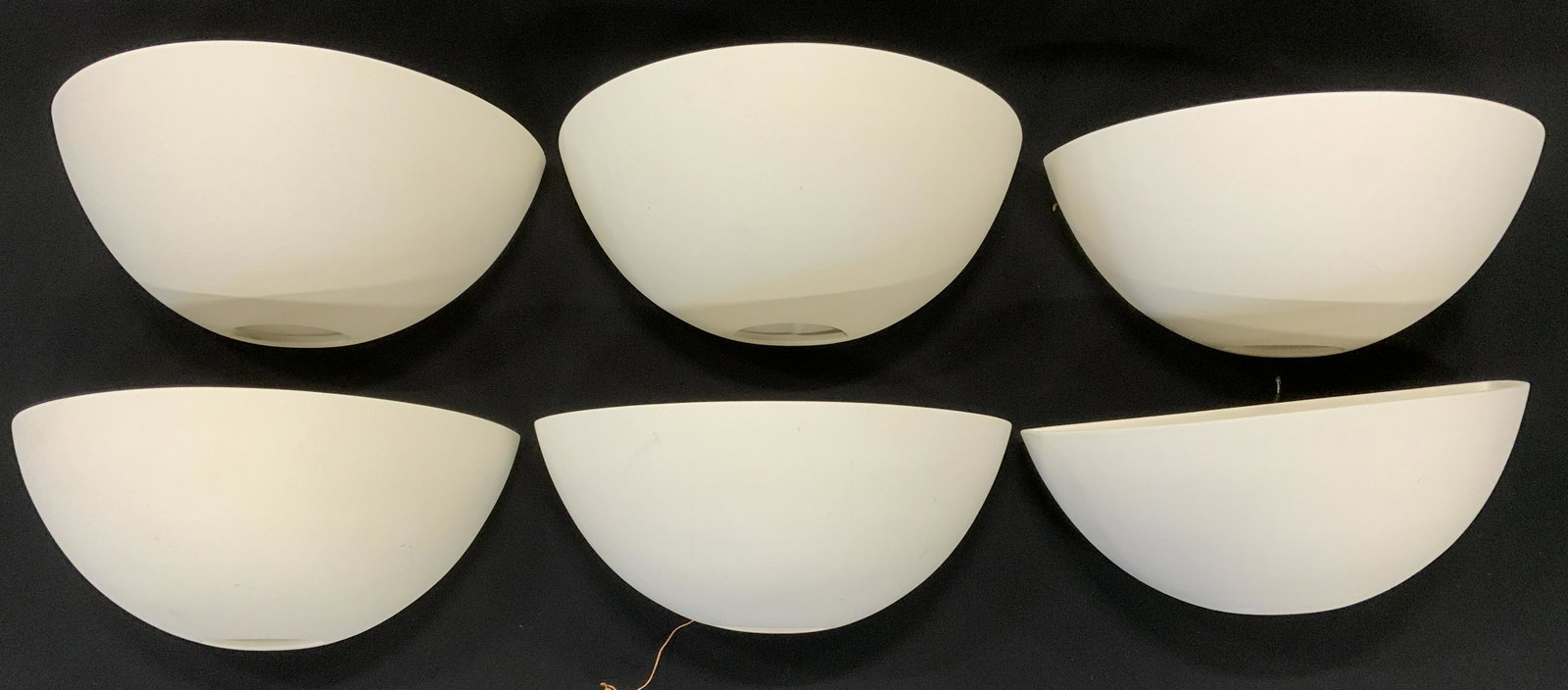 Set 6 Porcelain JUSTICE DESIGN GROUP Wall Sconces: Labels reads JUSTICE DESIGN GROUP. Lot includes 6 wall sconces. Each piece is cream toned. Each measures approx 13 inches wide 7 inches deep 5 inches tall. Wall sconces, Justice design group, porcelai