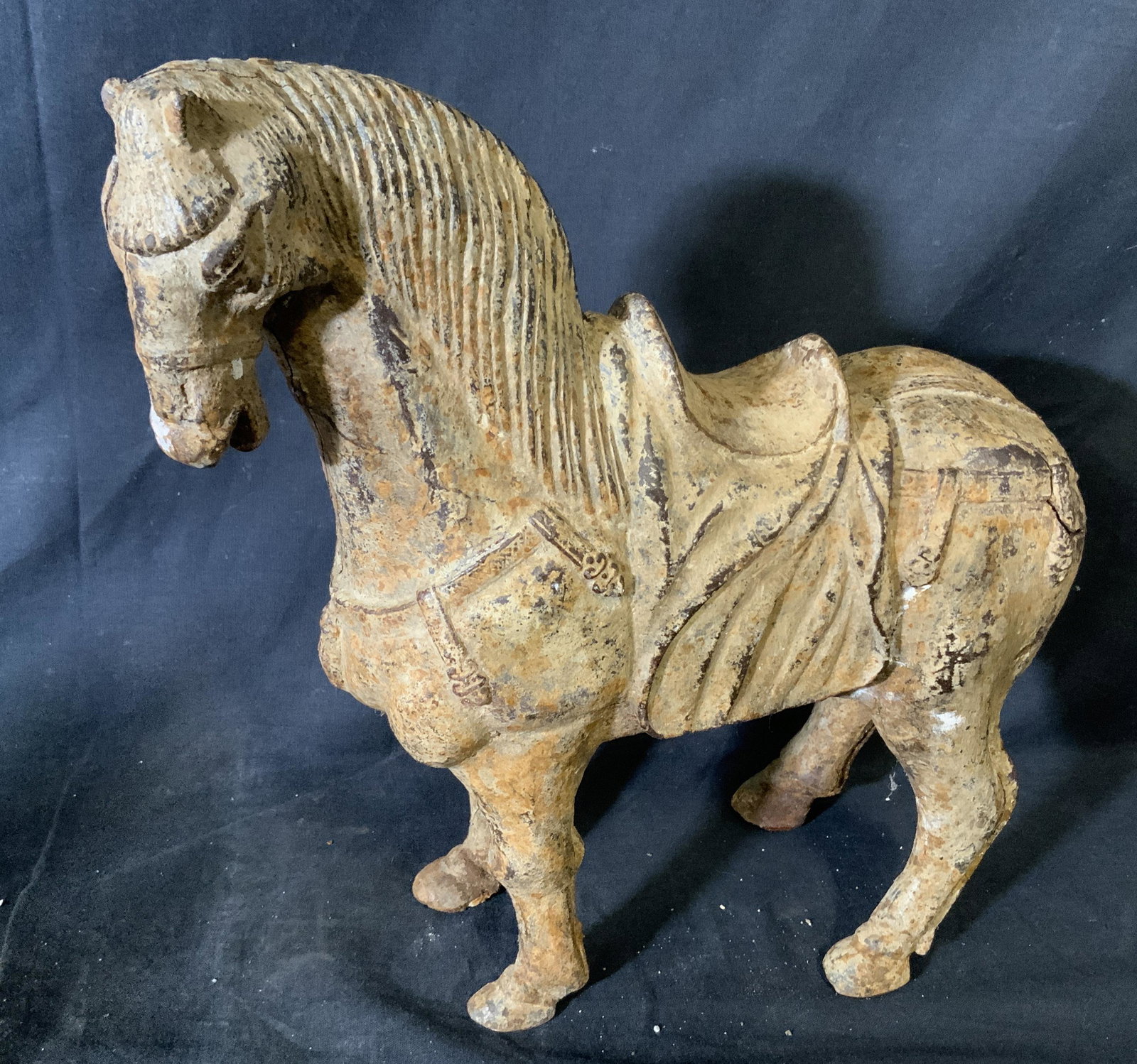 Antique Asian Cast Iron Horse Figural: Antique cast iron horse sculpture. Depicts a horse equipped with a saddle. Measures approx 12.75 inches H, and 12 inches W. Wear is consistent with age and exposure, loss present. C: Property of Manha
