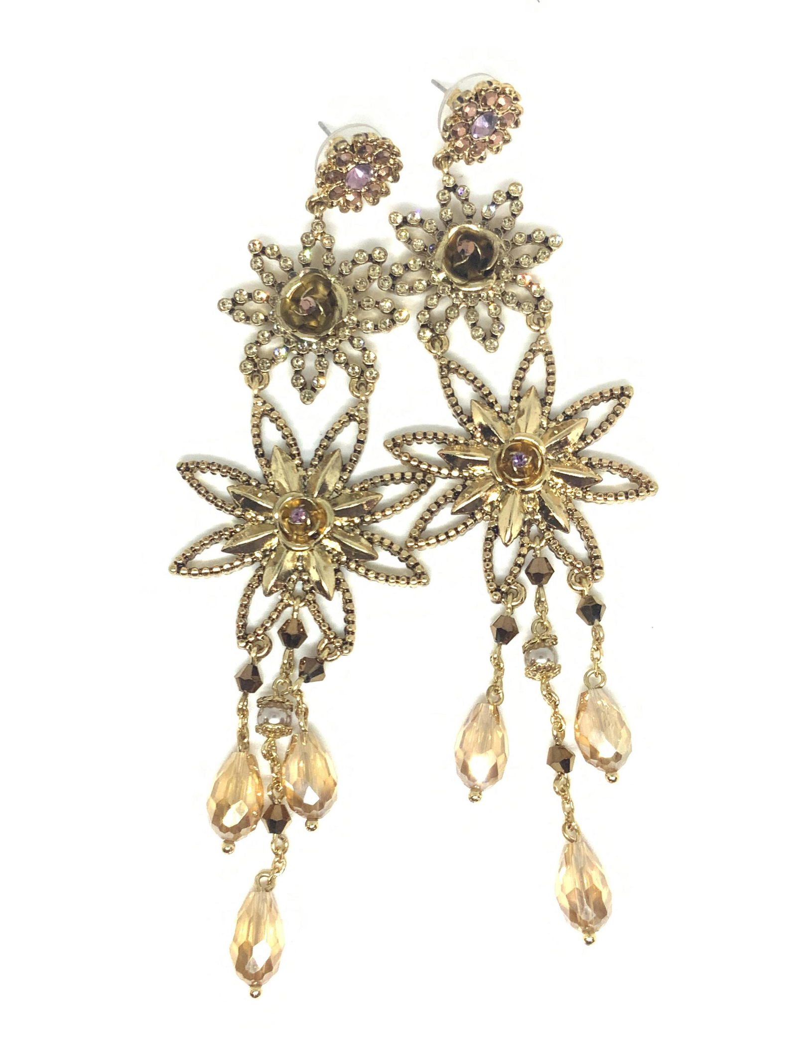 MIRIAM HASKELL Signed Vntg Floral Dangle Earrings: Signed, vintage, Miriam Haskell floral dangle drop earrings crafted from gold tone metal. The earrings feature etched & pierced metal designs accented by colorless, pink, and amber toned crystals. All