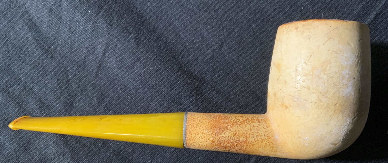 Antique Wooden Pipe W Bakelite Mouthpiece: Pipe is vintage possibly antique. Pipe appears to be Meerschaum. Pipe mouthpiece is Bakelite with a deep yellow tone. Piece measures approx 6 inches long 2 inches tall 1.5cinches wide. Pipe, antique p