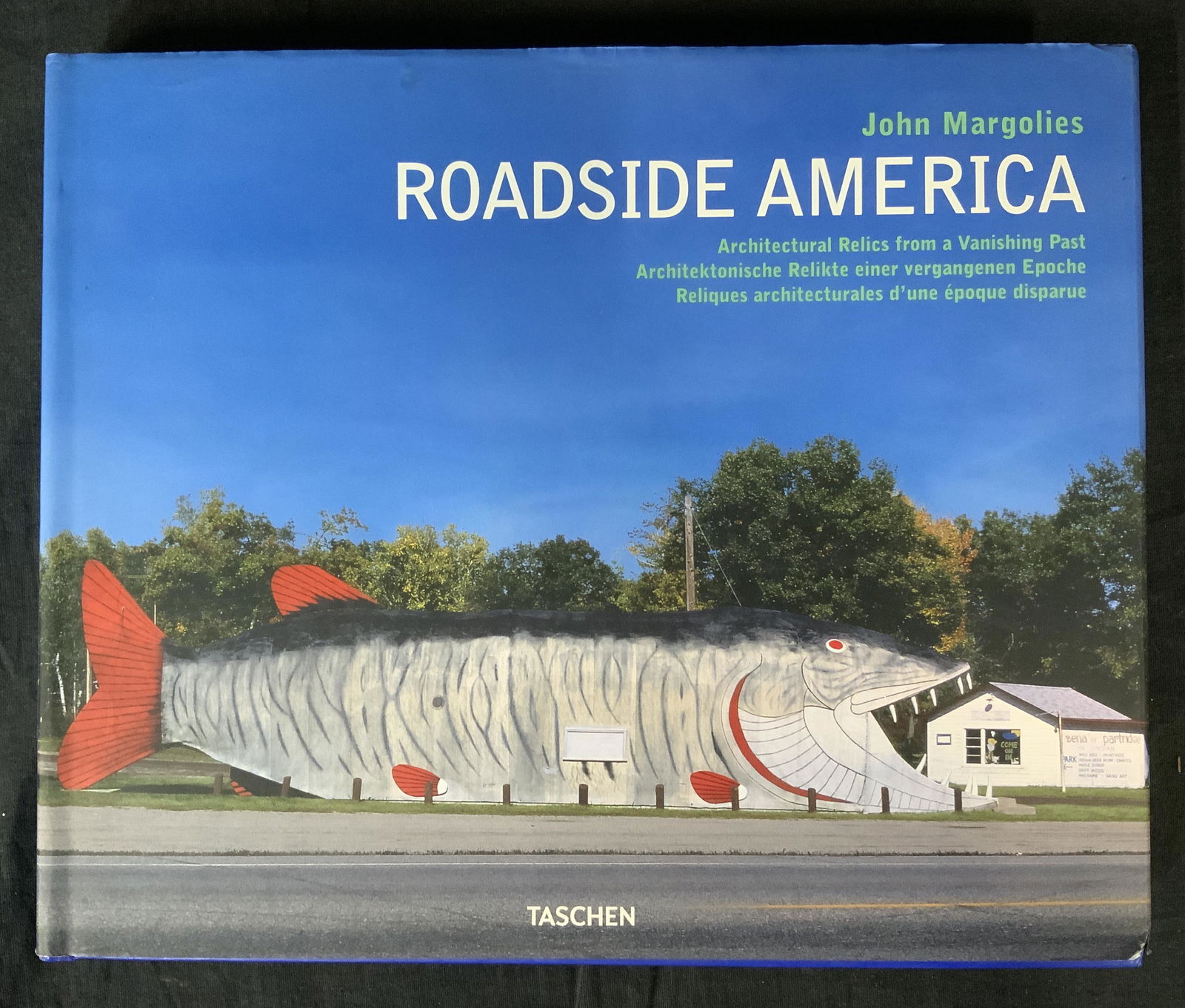 John Margolies Roadside America Coffee Table Book: John Margolies Roadside America Coffee Table Book, inscription to cover reads ‘ John Margolies Roadside America Architectural Relics from a vanishing past Taschen’, measures 10 3/8 x 12 5/8 inches