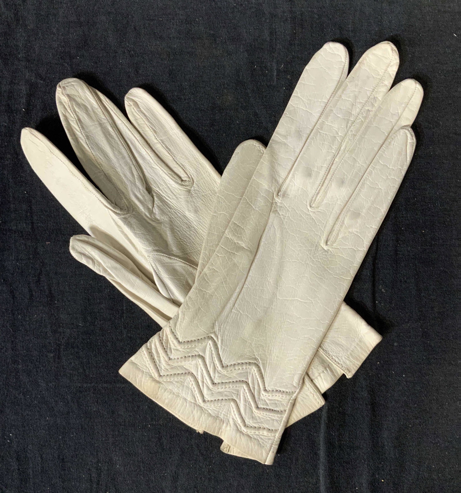 Vintage CHRISTIAN DIOR Leather Gloves: Vintage CHRISTIAN DIOR Leather Gloves, inscription to interior reads ‘Christian Dior’ and ‘7 1/2’, both measure 8 1/2 x 3 3/8 inches at widest point, wear consistent with vintage condition, co