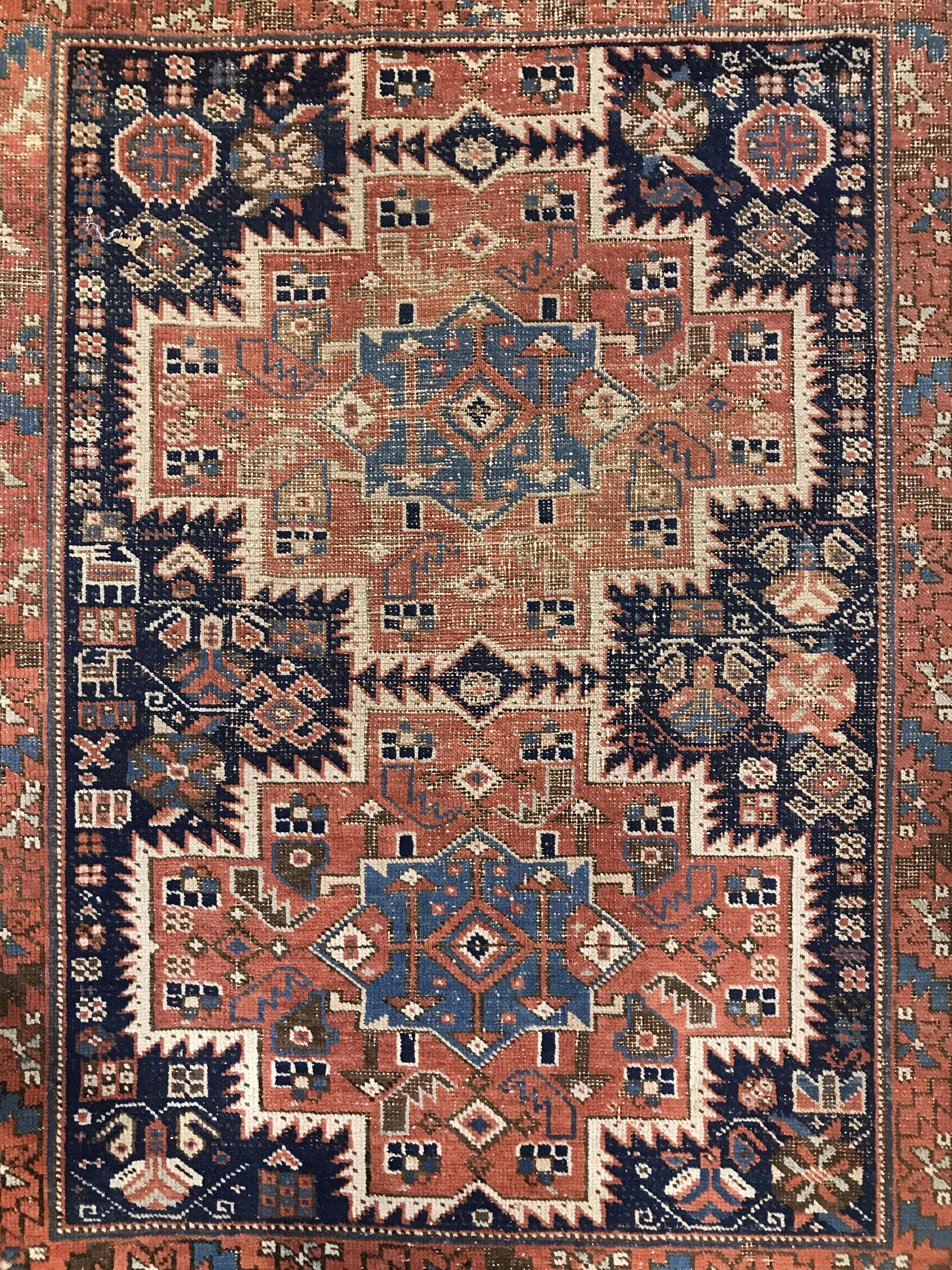 Vintage Handmade Turkish Wool Rug: Rug is wool and handmade. Piece is vintage possibly antique. Rug has intricate multi toned geometric detail. Piece measures approximately 67 inches long 50 inches wide. Rug, carpet, area rug, wool rug